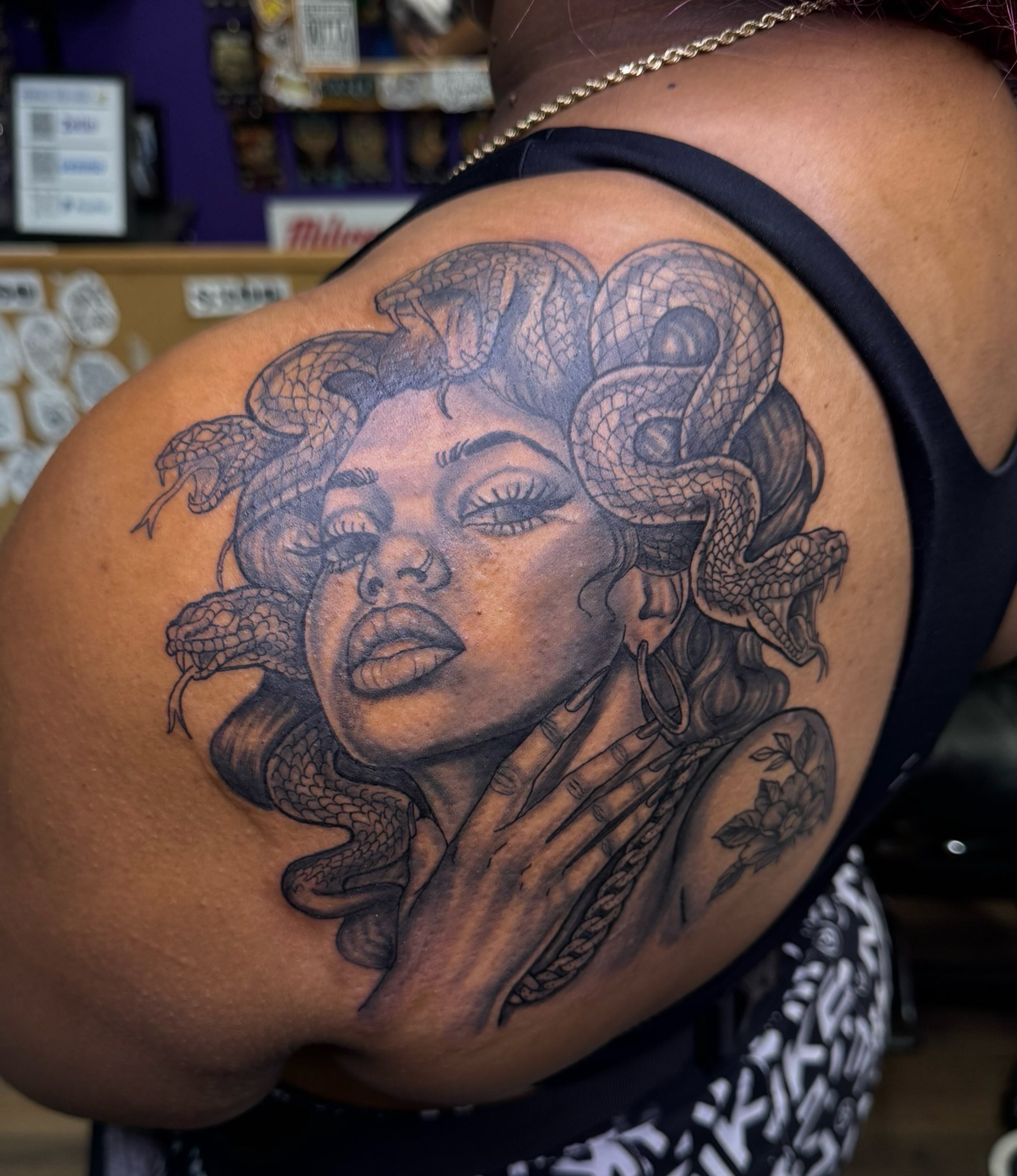 Medusa realism tattoo on the shoulder by Christian Goines, Memphis, Tennessee