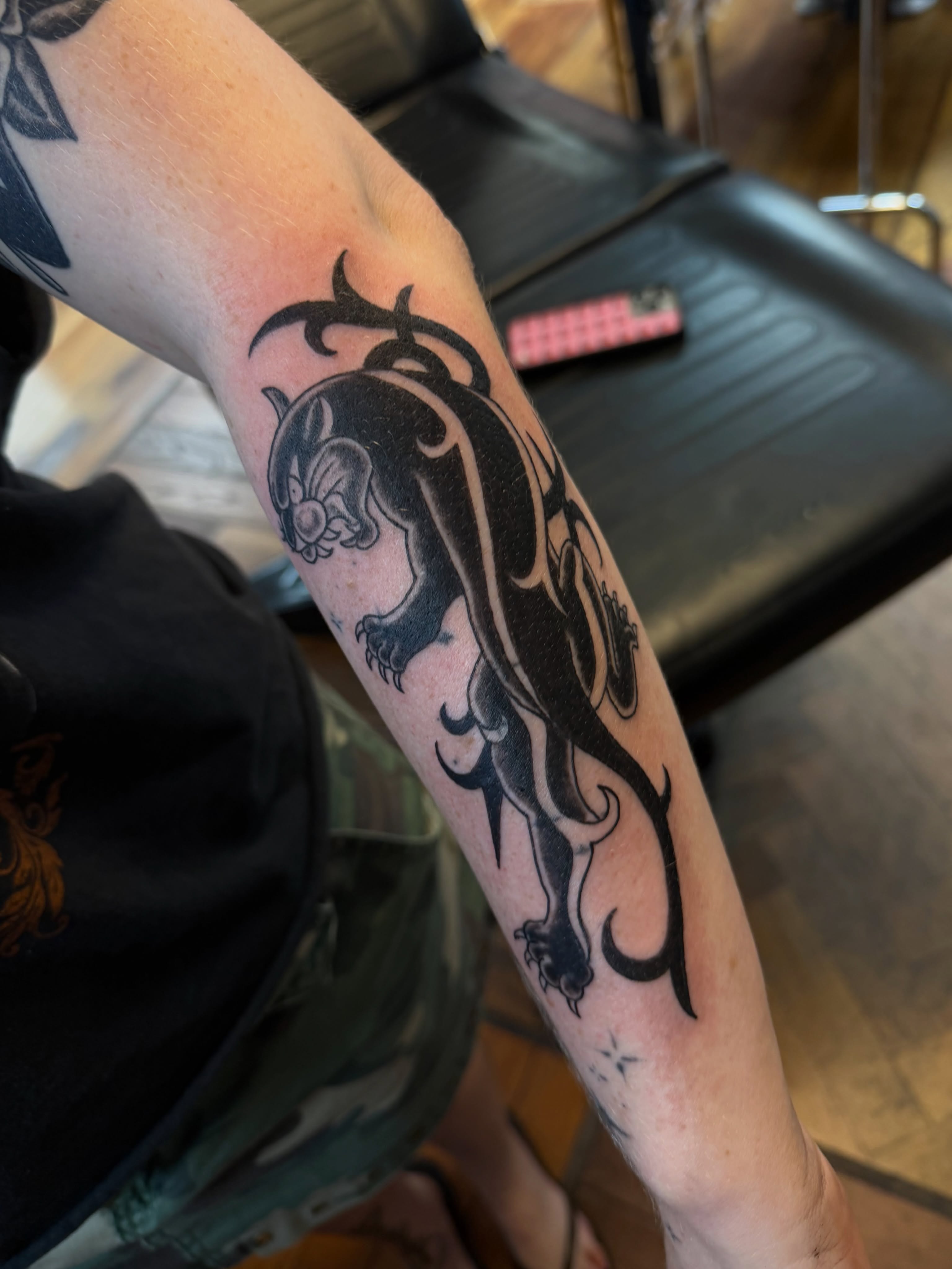 Cat and floral tribal tattoo on the forearm by Maddie Blosser, Portland, Oregon