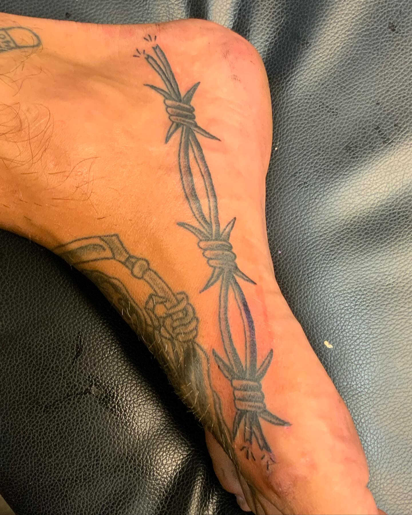 Barbed wire black and grey tattoo on the foot by Franky Sharpz