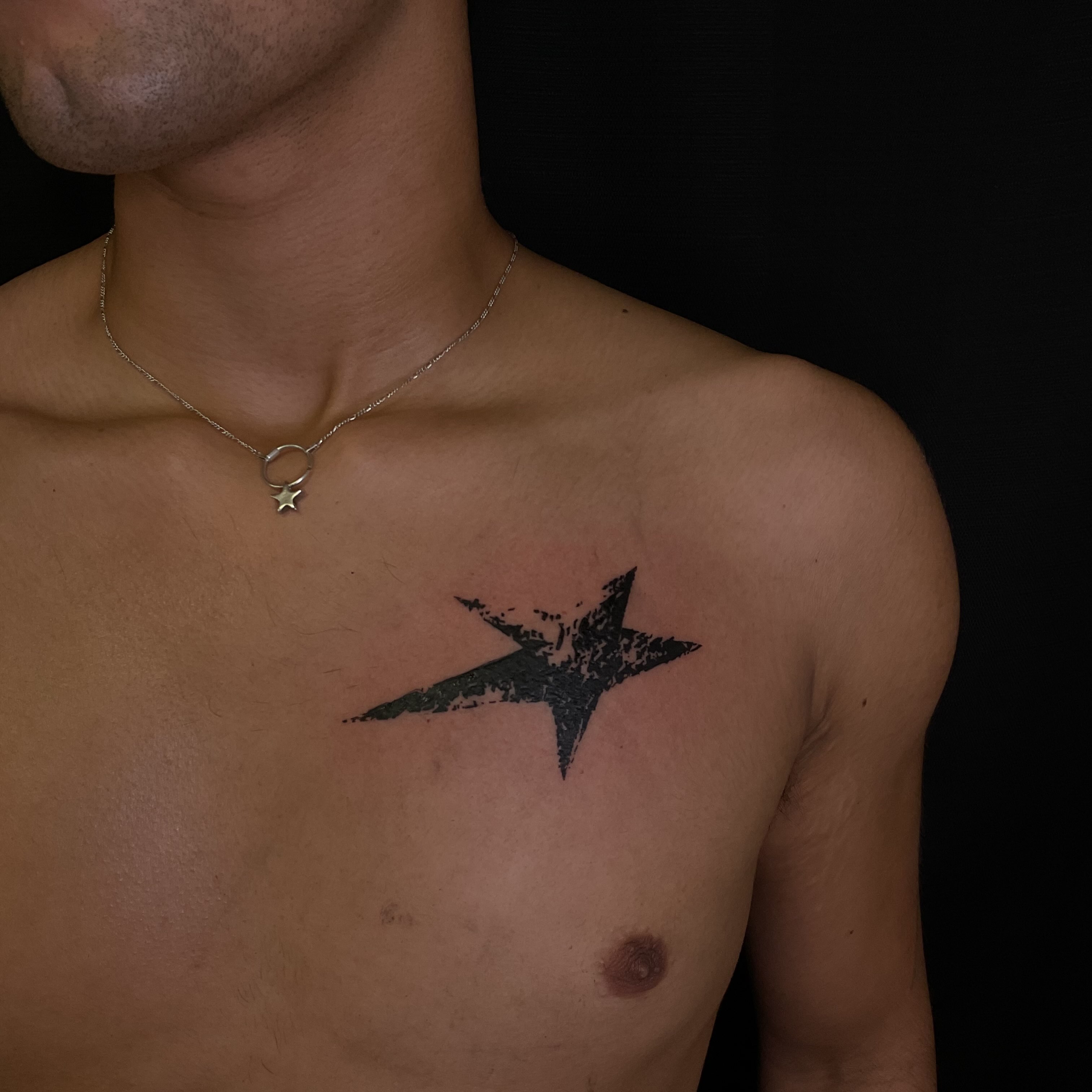 Star dotwork tattoo on the chest by Pres!