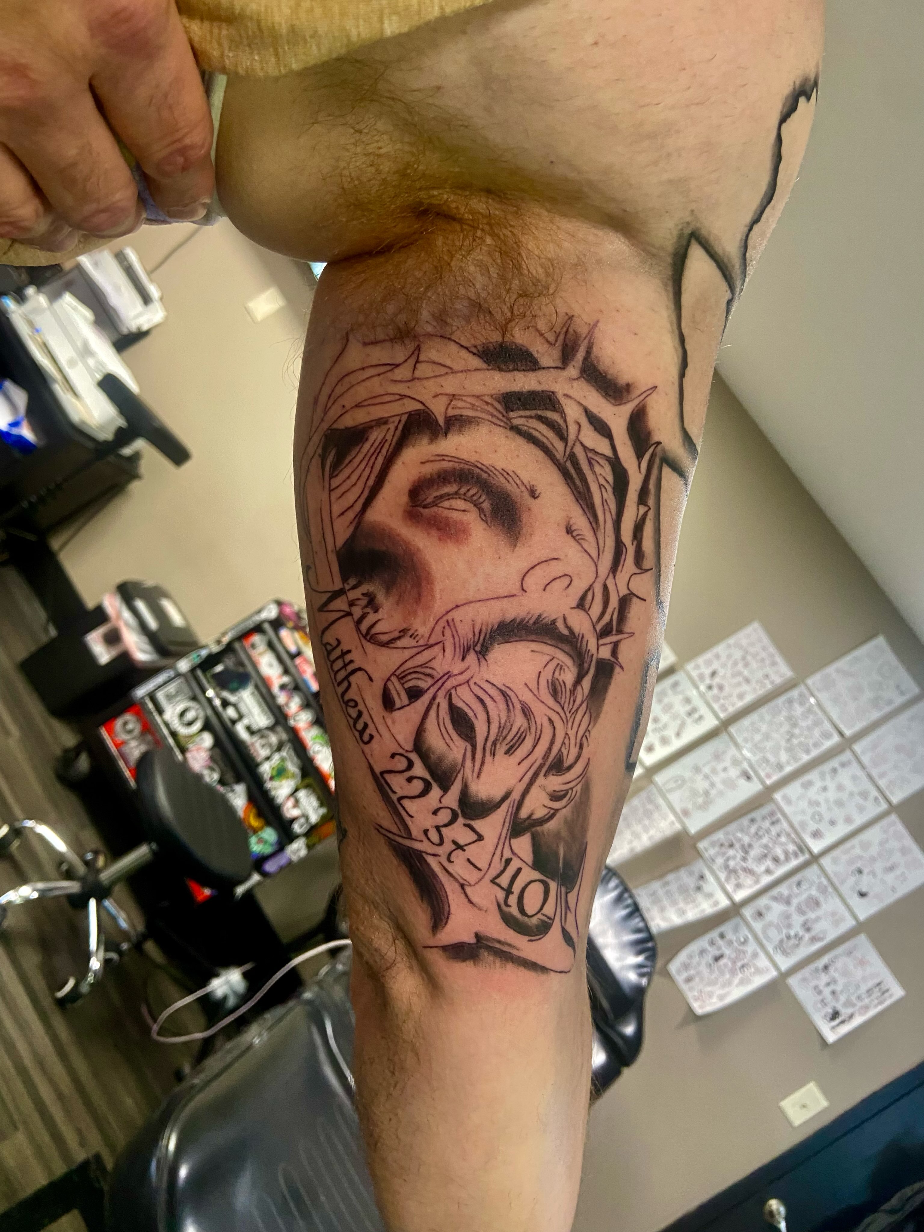 Jesus Christ realism tattoo on the forearm by Mike Berry