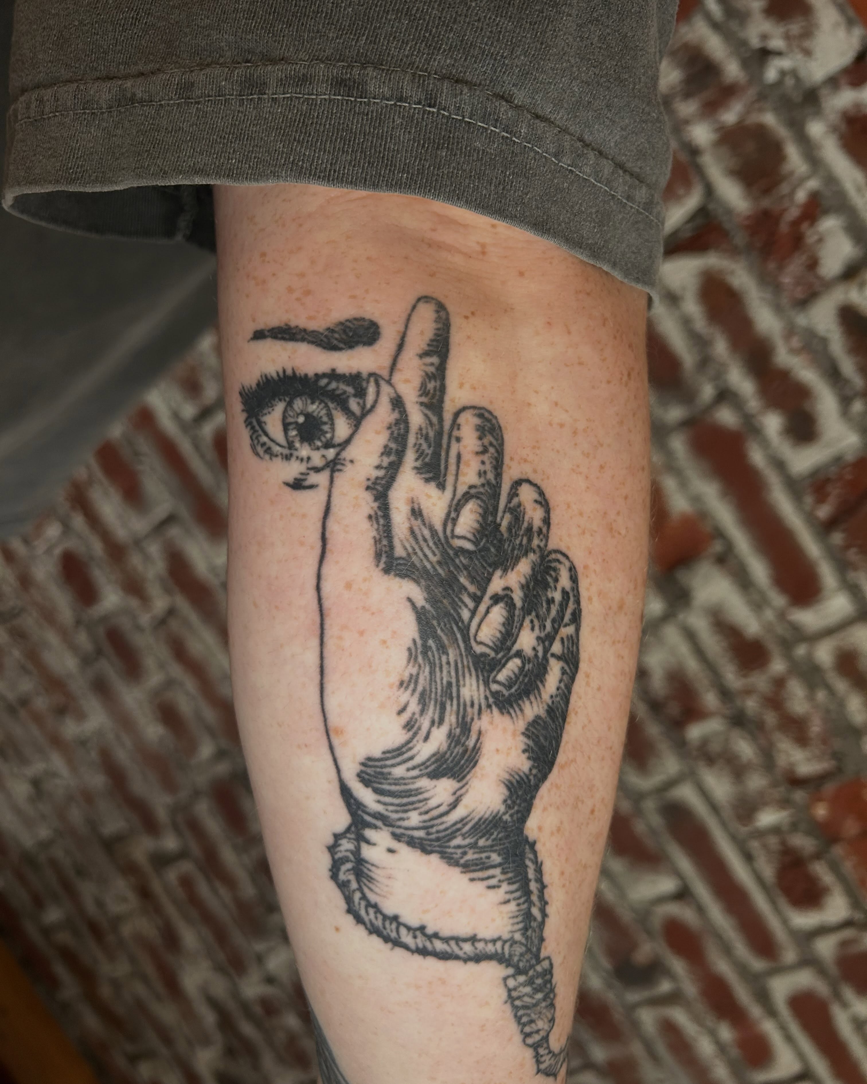 Eye and hand black and grey tattoo on the forearm by ๐๐๐๐๐๐ ๐๐๐๐๐๐ ๐๐๐๐๐๐