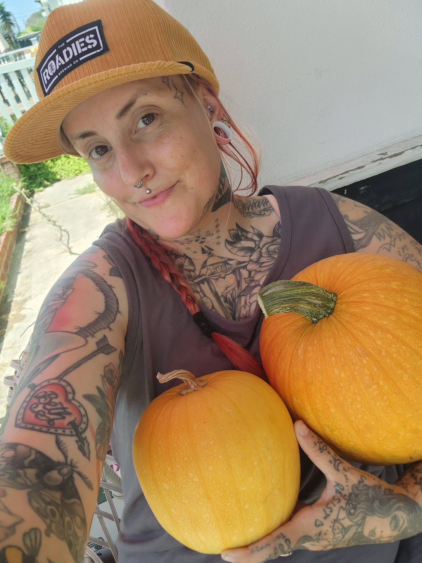 Pumpkins American traditional tattoo on the upper arm by Meggalodon 🖤 (Meggan Rose)