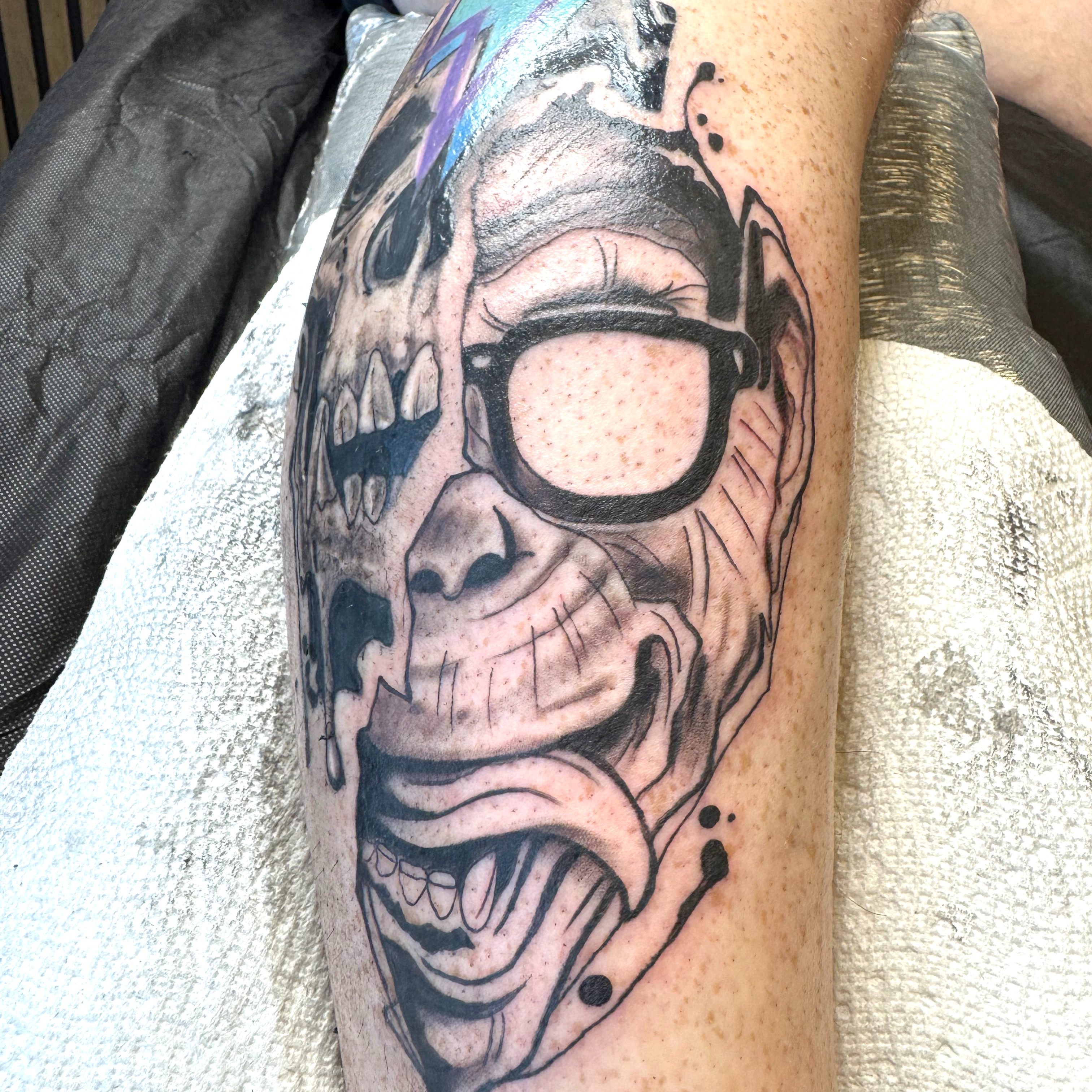 Grinning skull realism tattoo on the forearm by R o s e