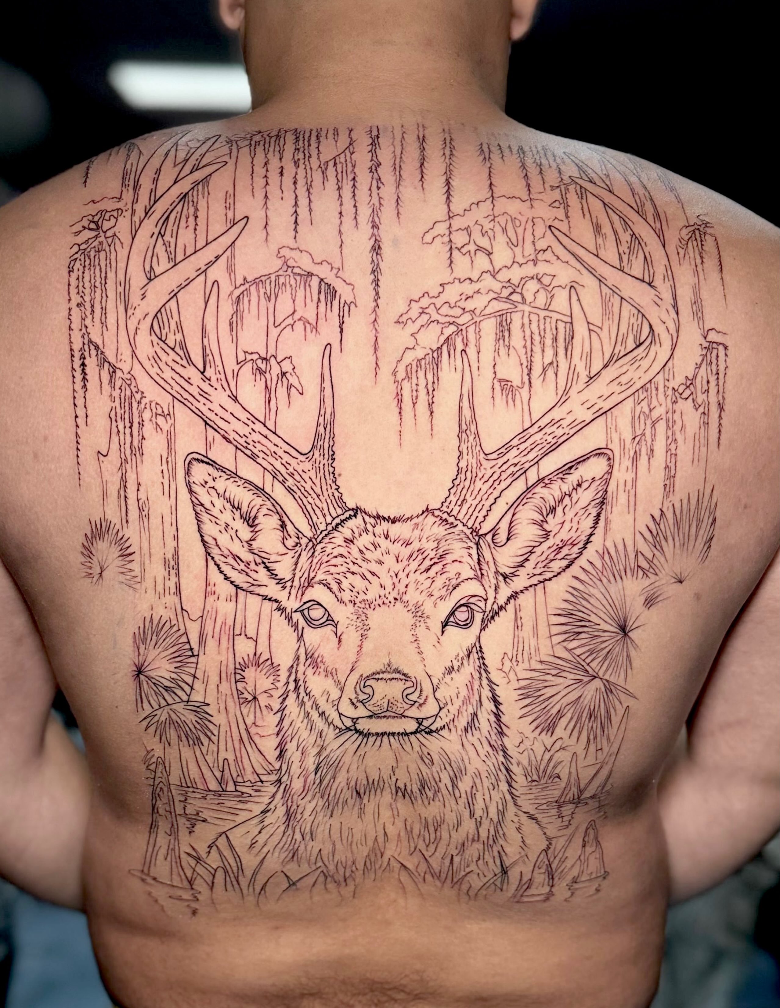 Deer realism tattoo on the back by Exis LHinc, Miami, Florida