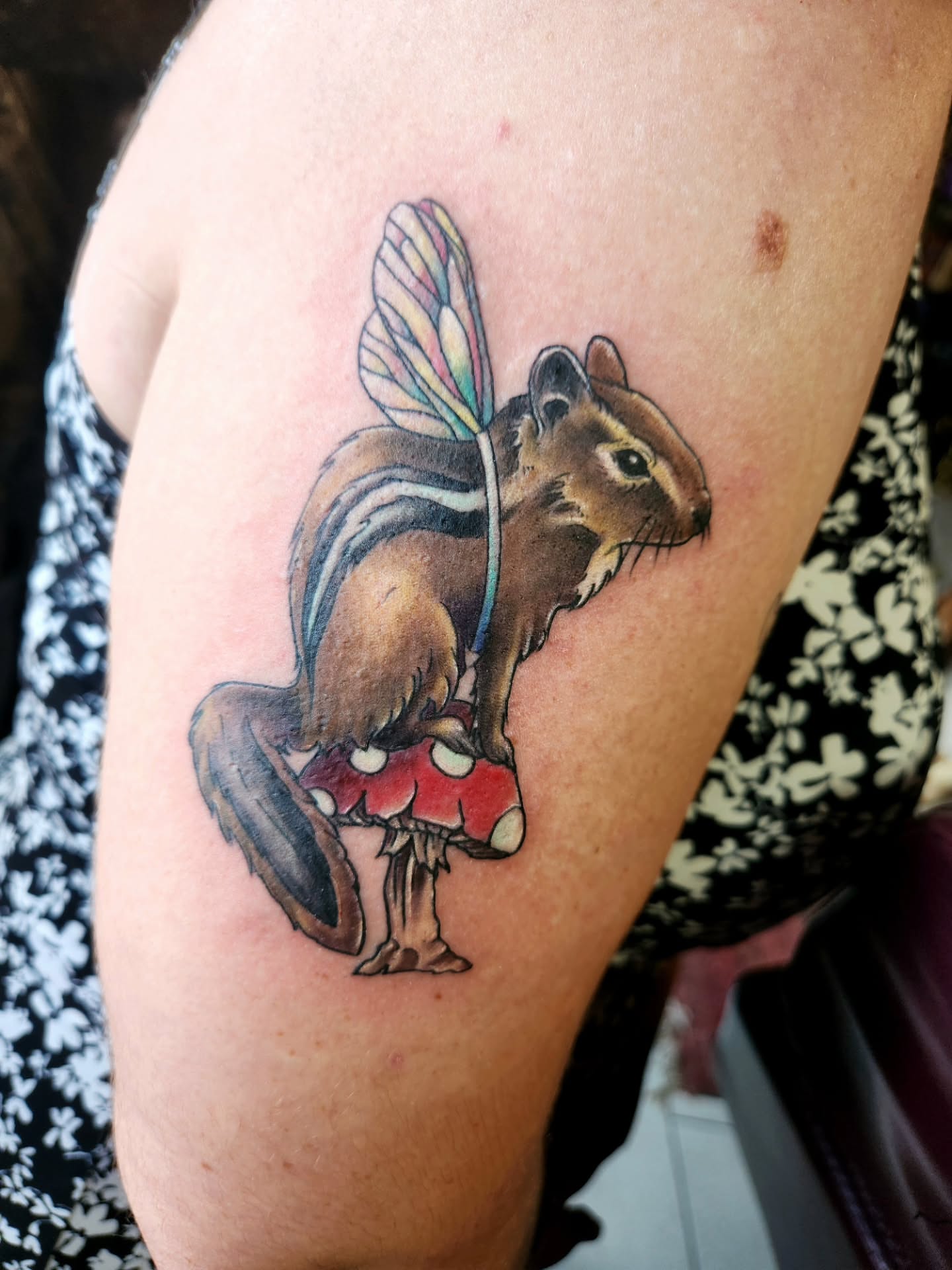 Chipmunk realism tattoo on the upper arm by Heather