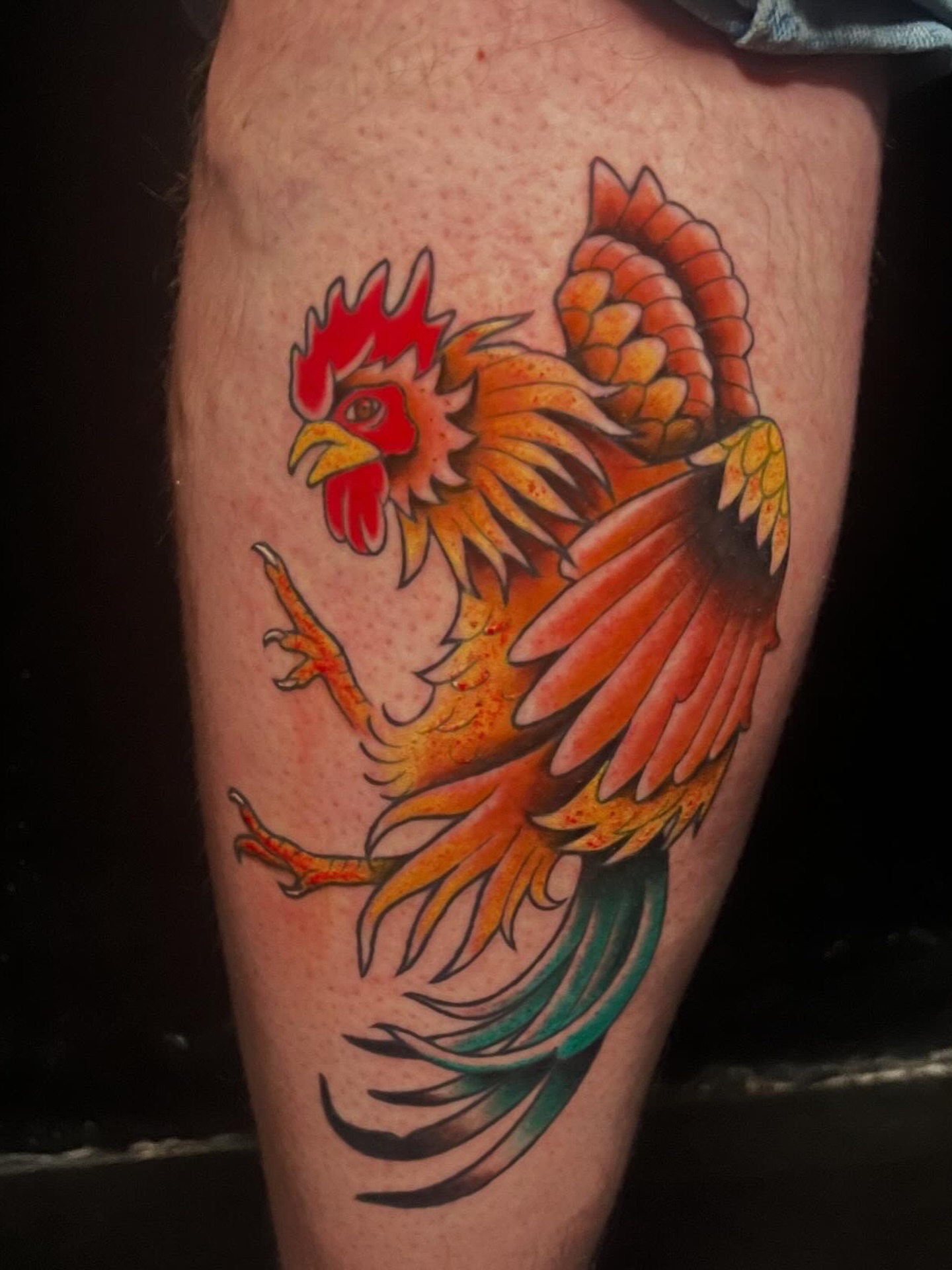 Rooster American traditional tattoo on the thigh by Lexi Ross