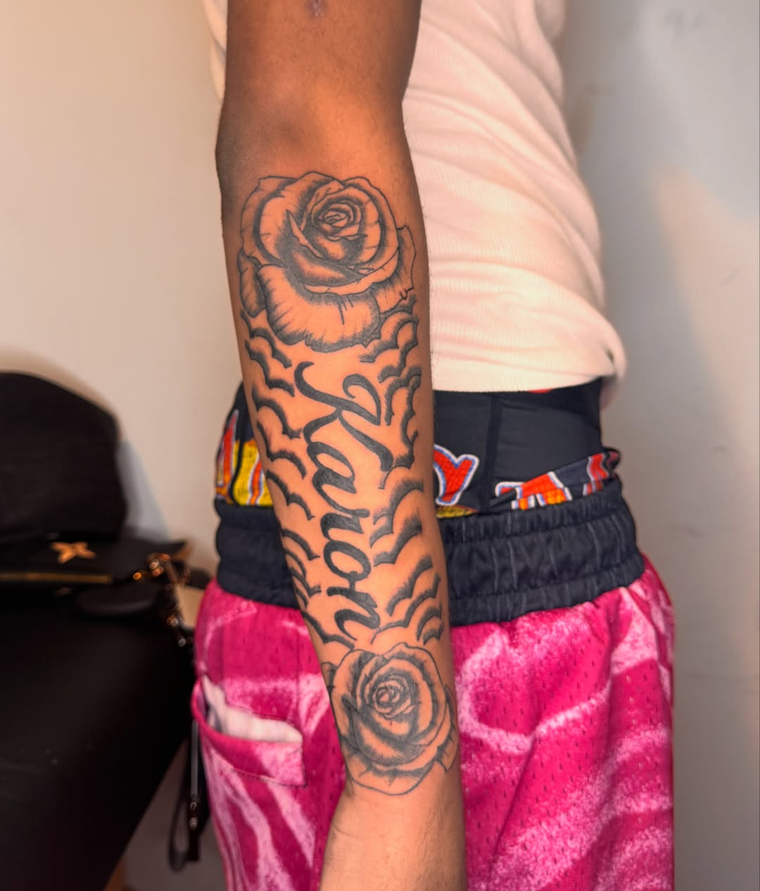 Rose black and grey tattoo on the forearm by Comet