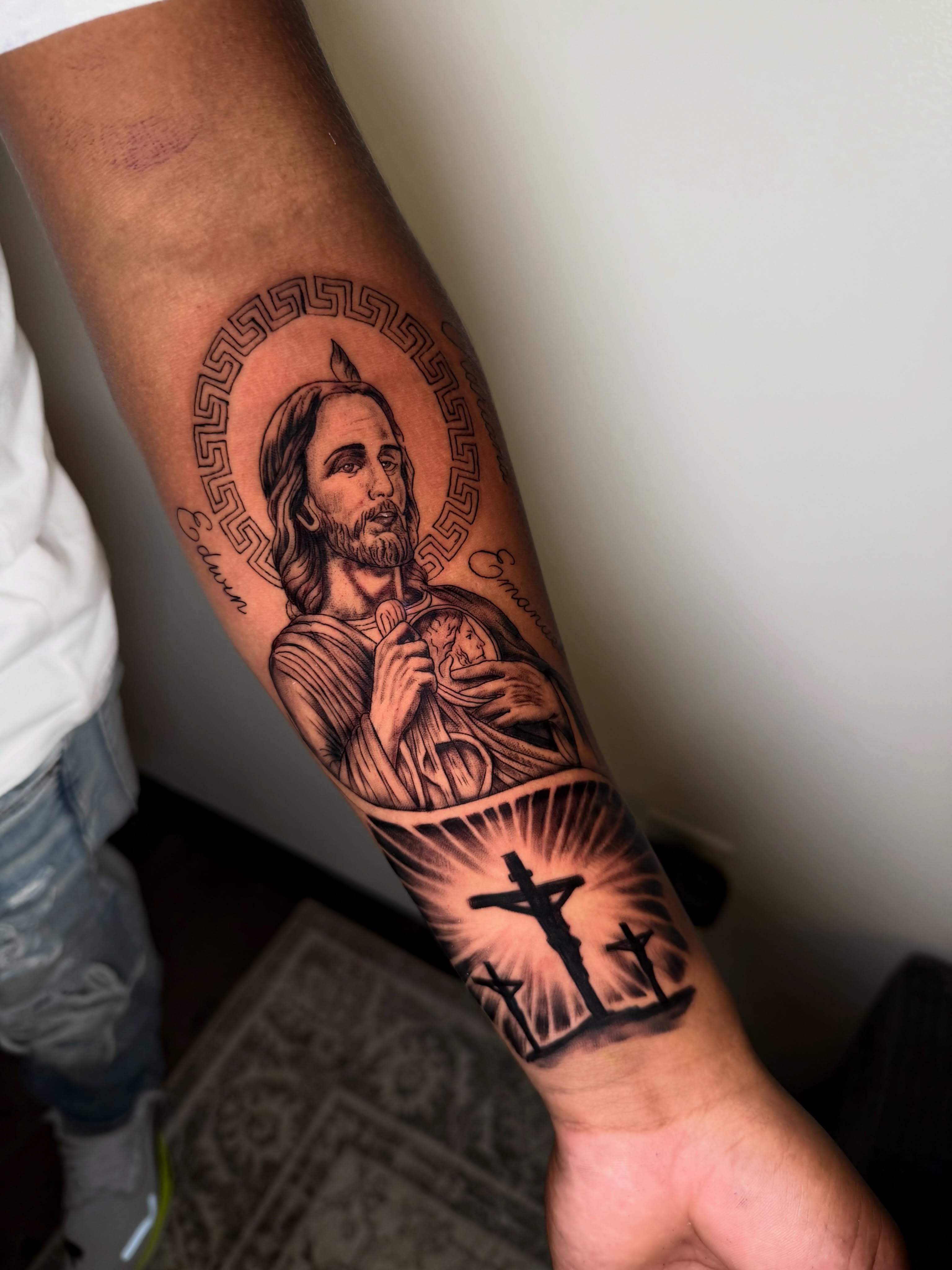 Religious figure black and grey tattoo on the forearm by Sebastian martinez, Memphis, Tennessee
