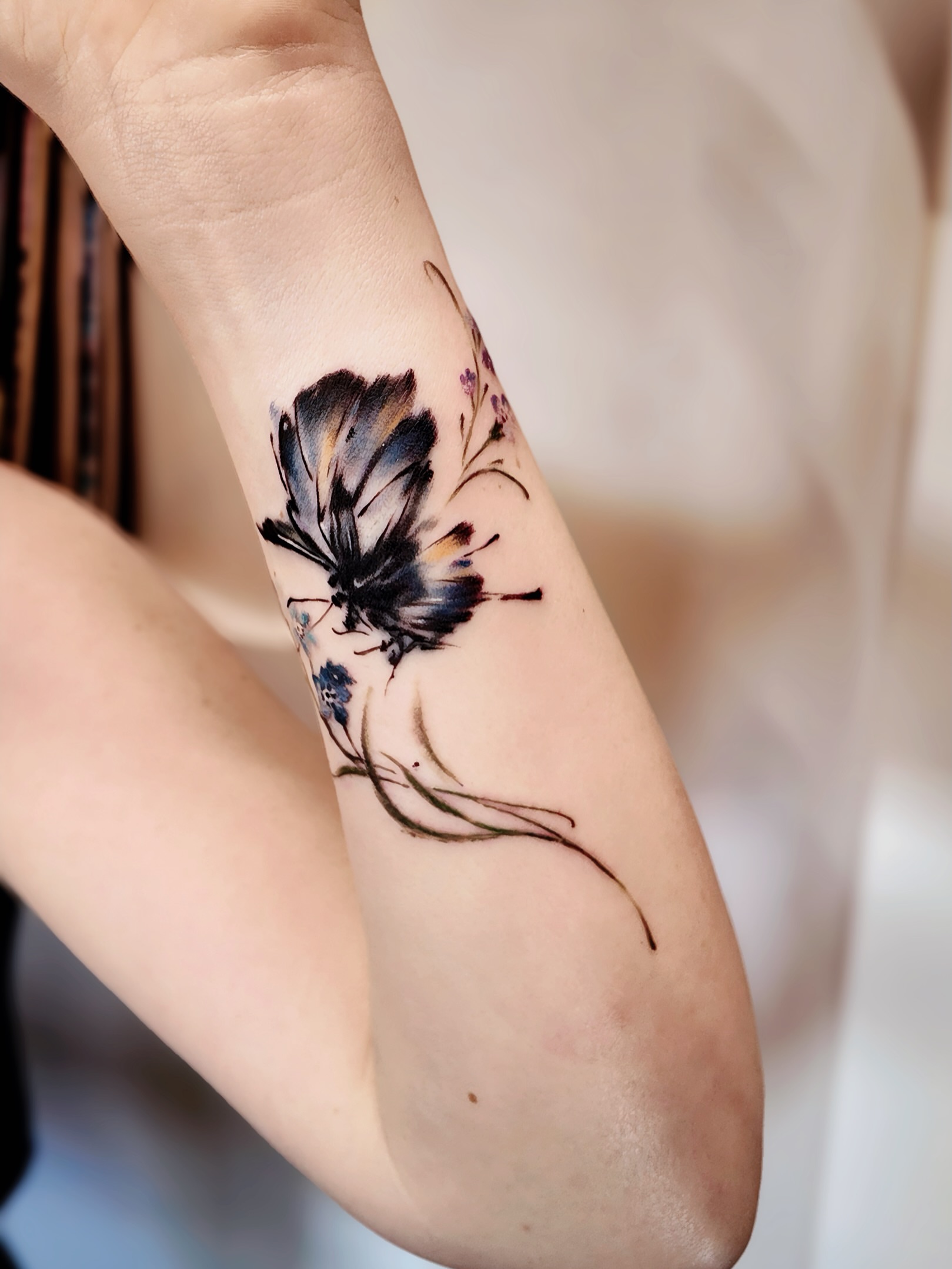 Tattoo by @junsinkmontreal — watercolor