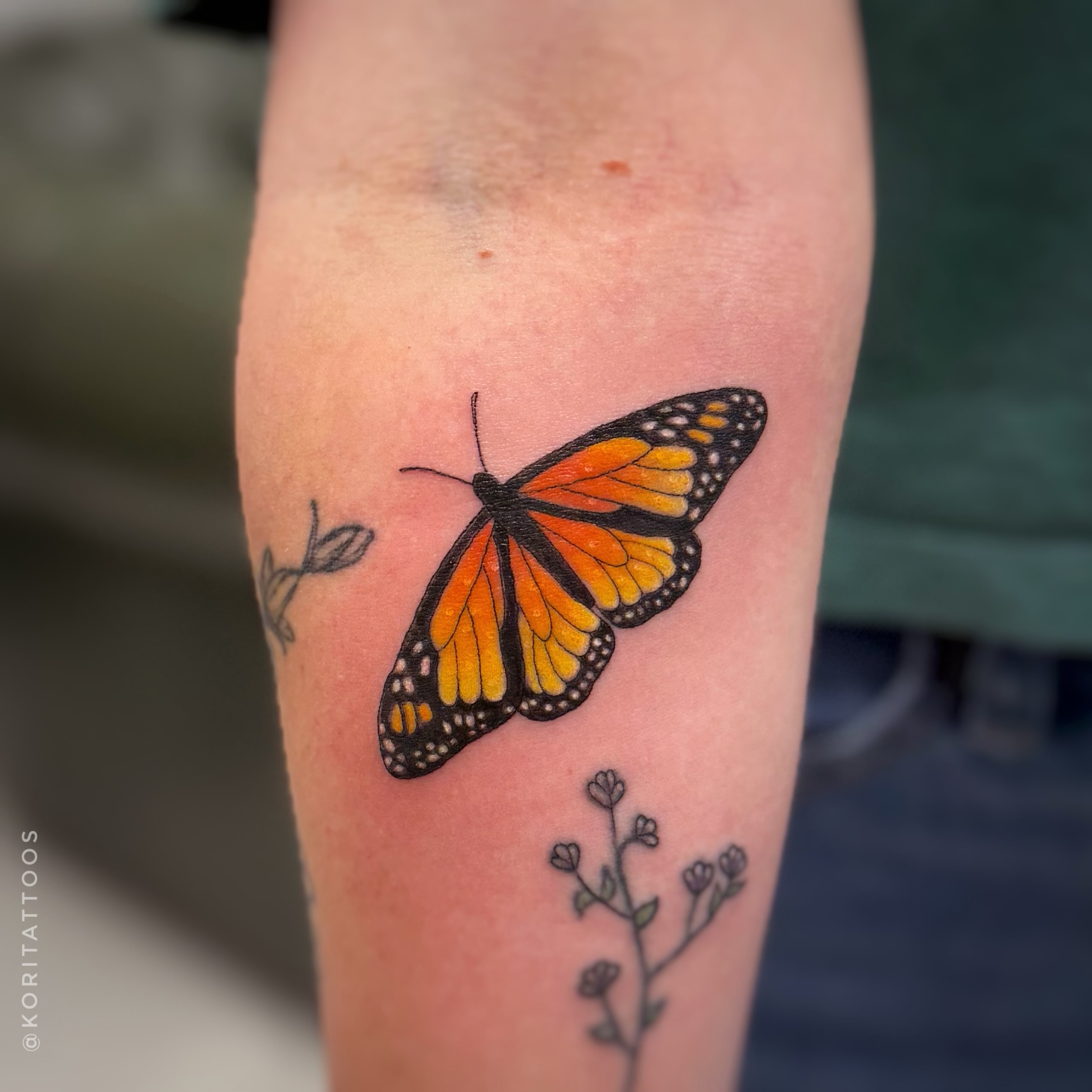 Monarch butterfly dotwork tattoo on the forearm by Kori Millhimes