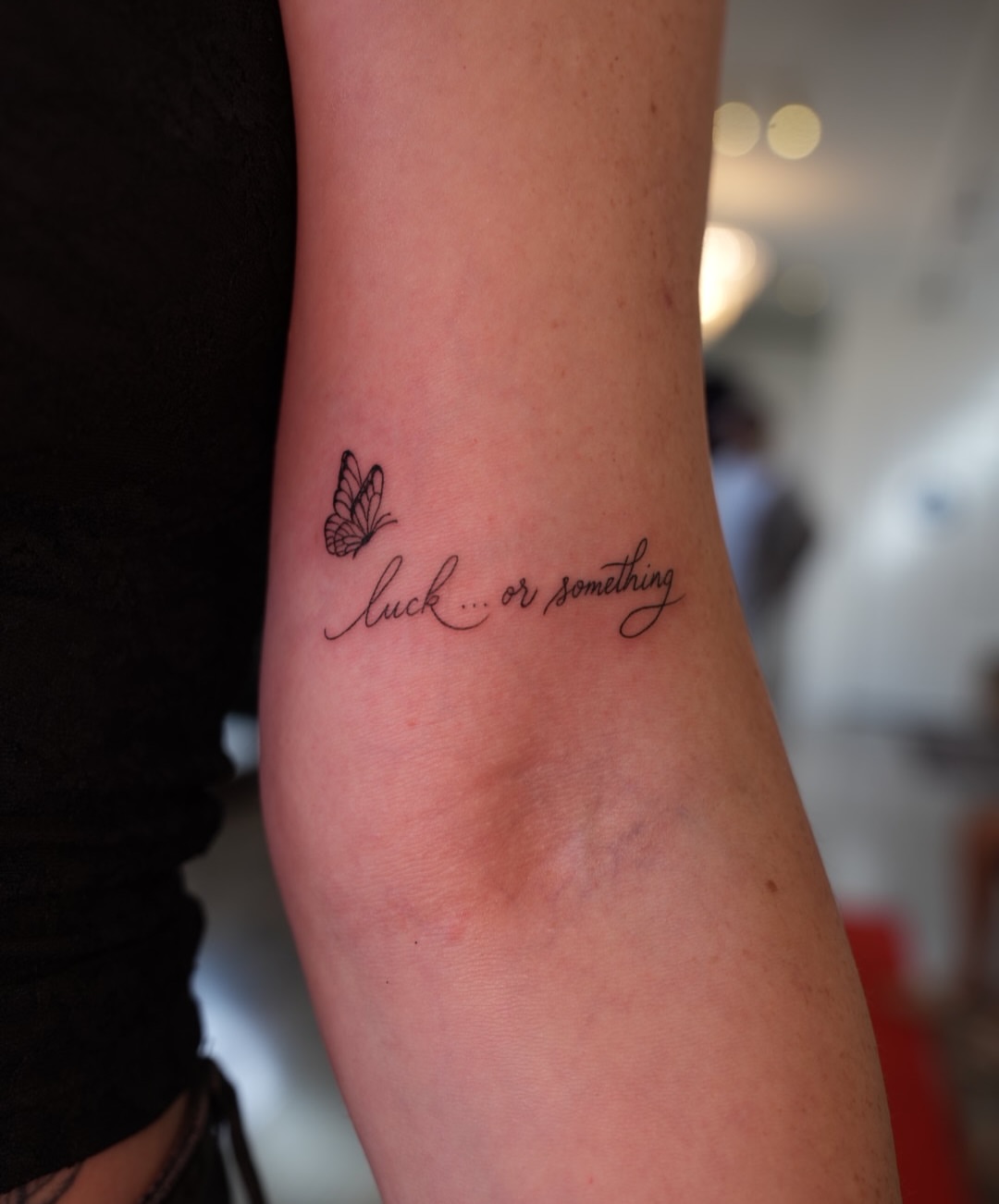 Butterfly fine line tattoo on the forearm by 🤍 Sarah 🖤