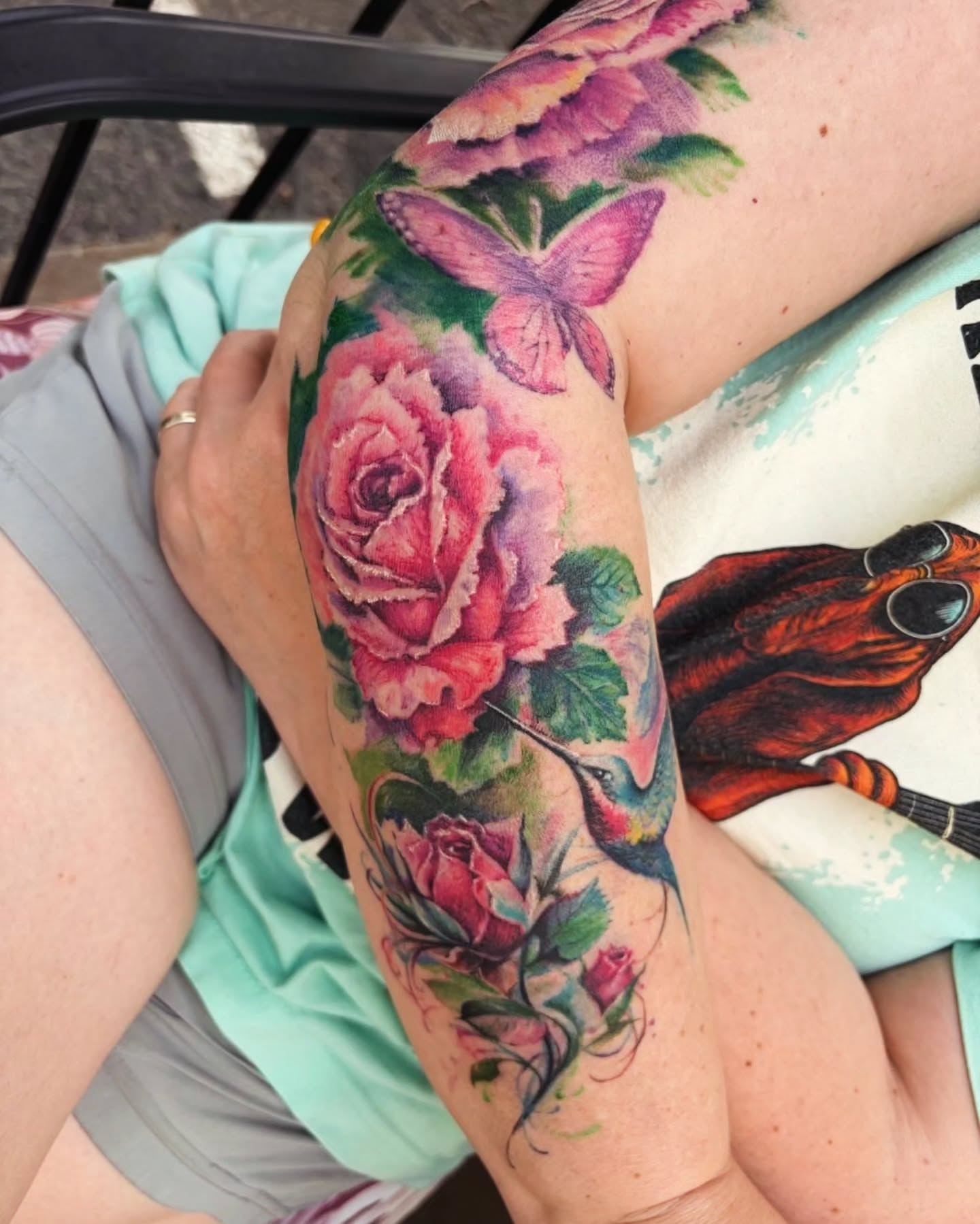 Roses and hummingbird watercolor tattoo on the forearm by Dr. Valerio Vegas Tattoo