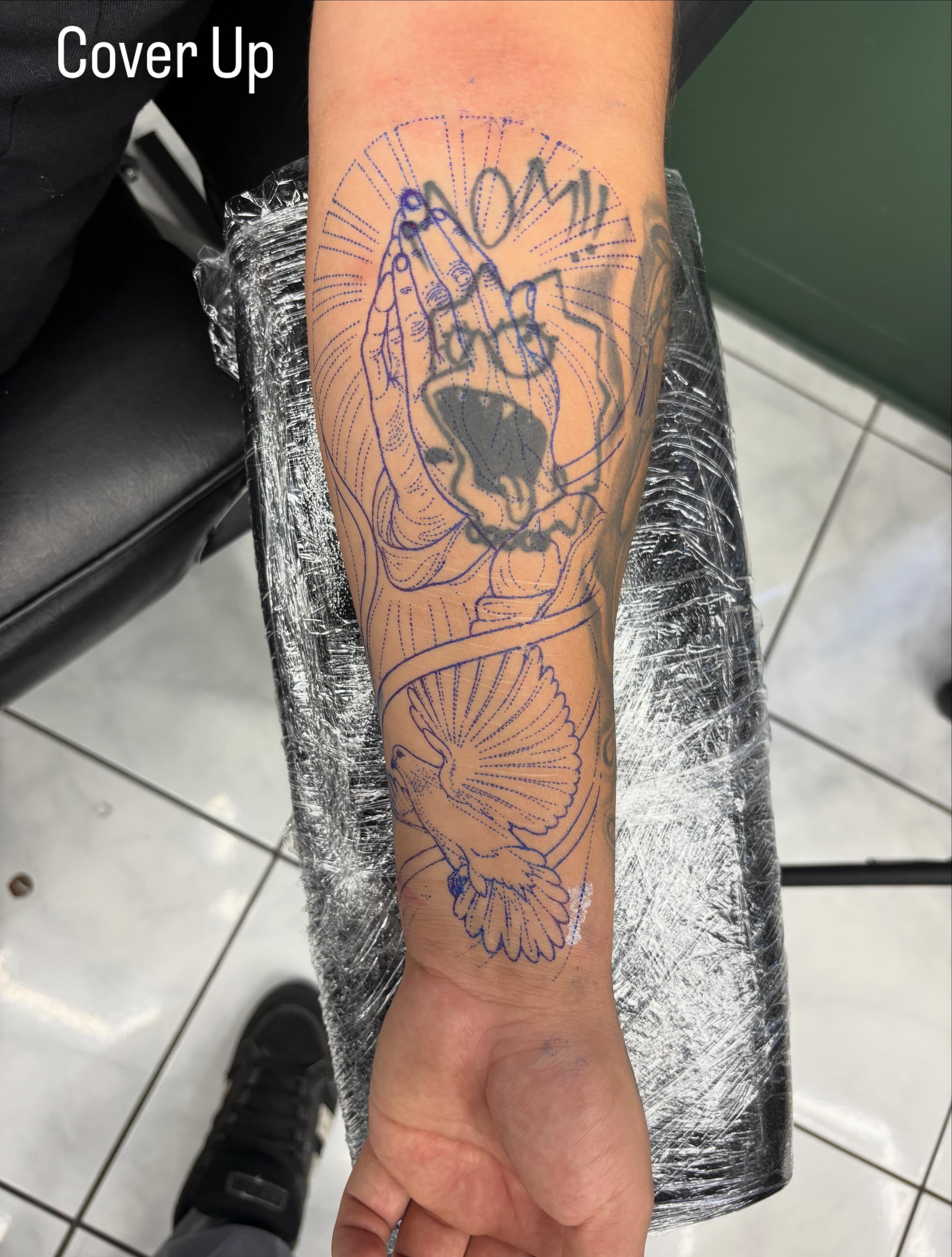 Praying hands with dove dotwork tattoo on the forearm by Shadows Tattoos