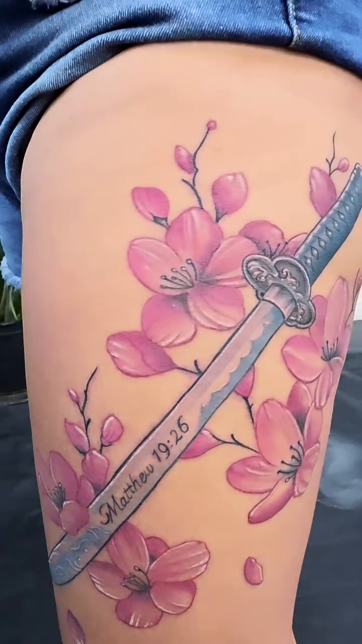 Katana and cherry blossoms japanese irezumi tattoo by Jo'el Acoba