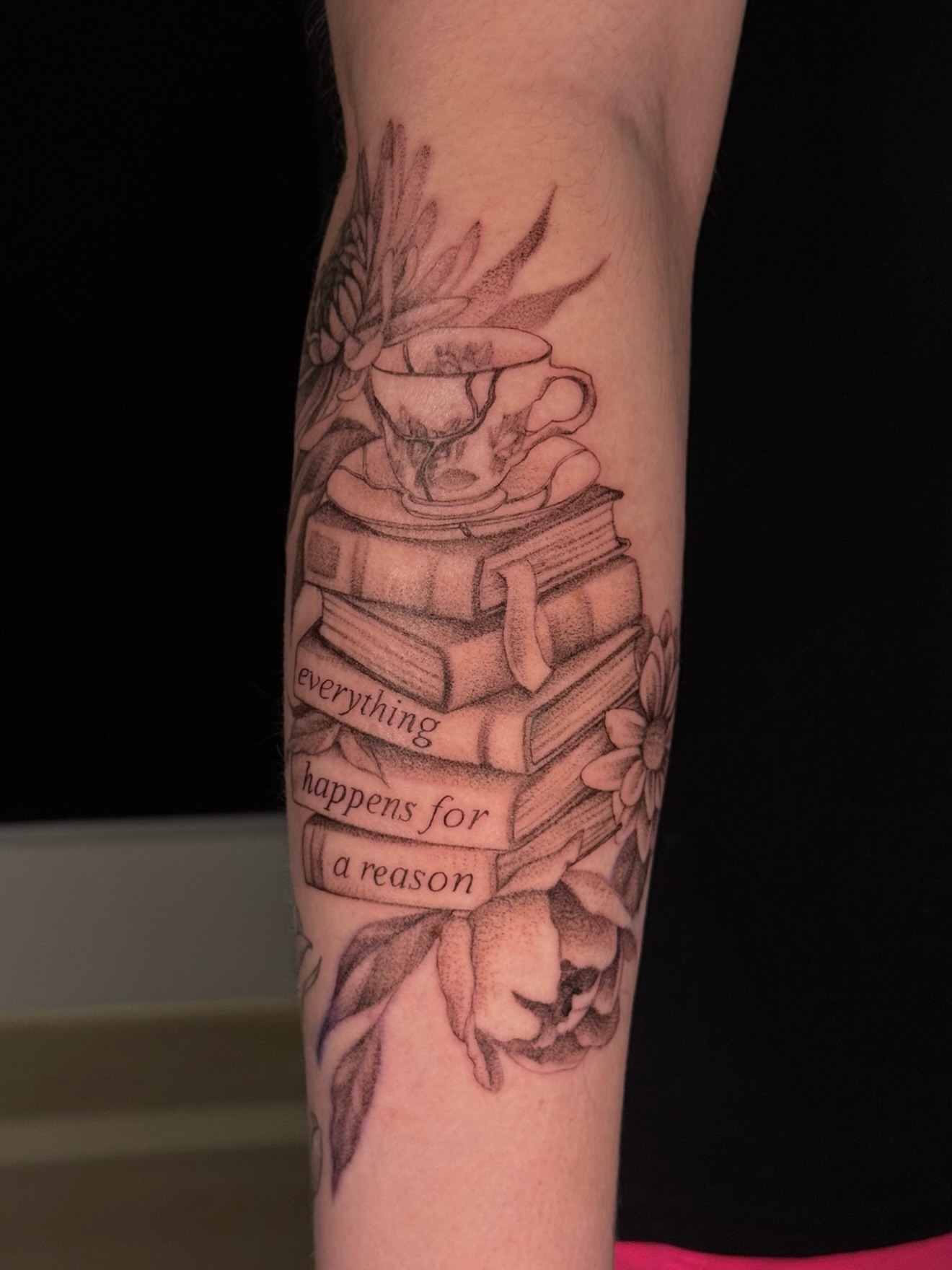 Books and teacup realism tattoo on the forearm by Alyssa Fazzino ⟡ CT Tattoo Artist, Rocky Hill, Connecticut