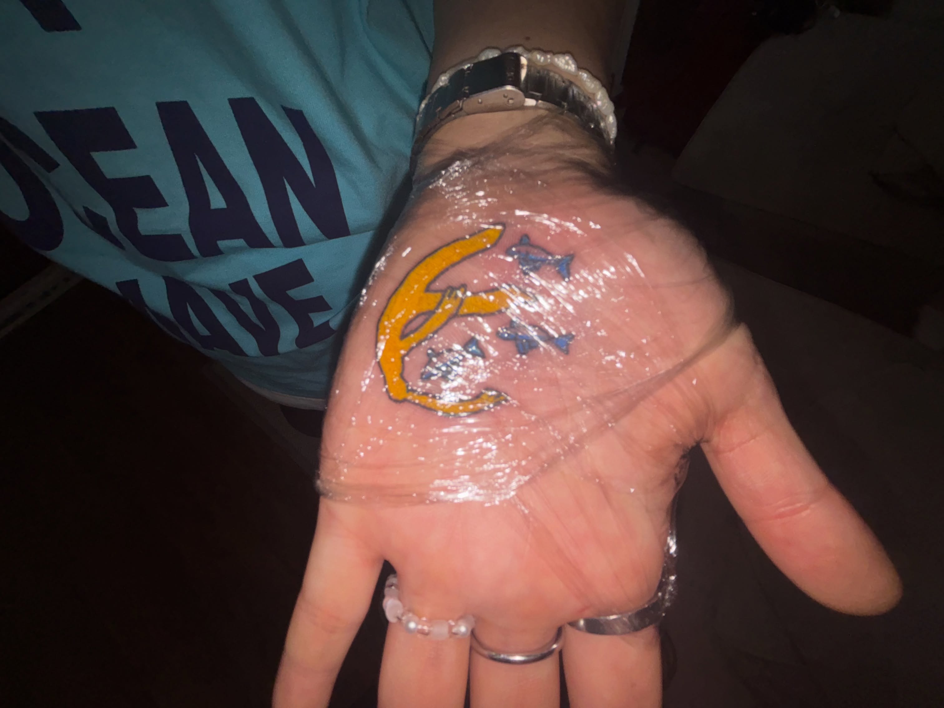 Dolphin American traditional tattoo on the hand by 드로잉타투 자유🧍