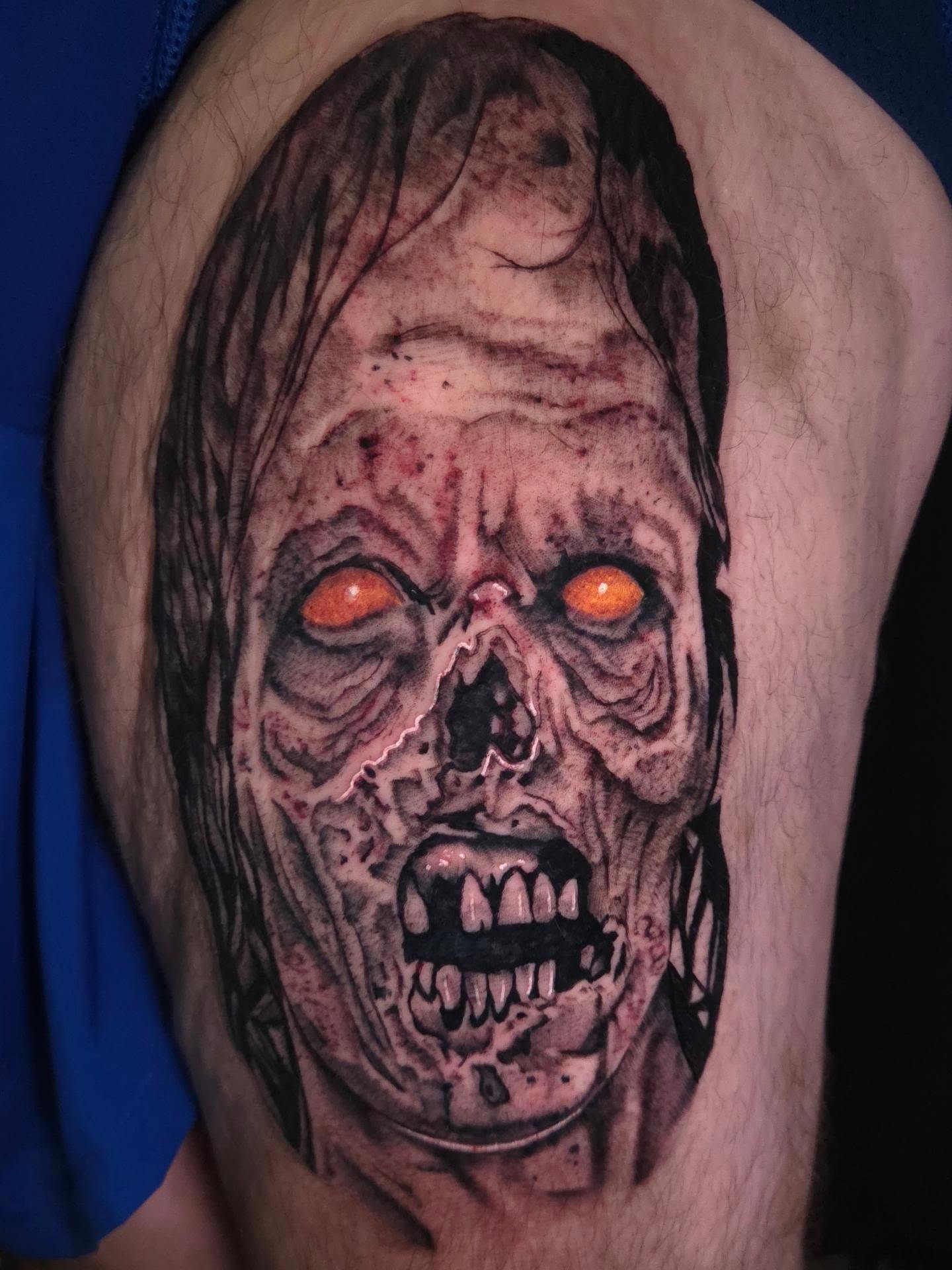 Zombie realism tattoo on the thigh by Maya Neideck