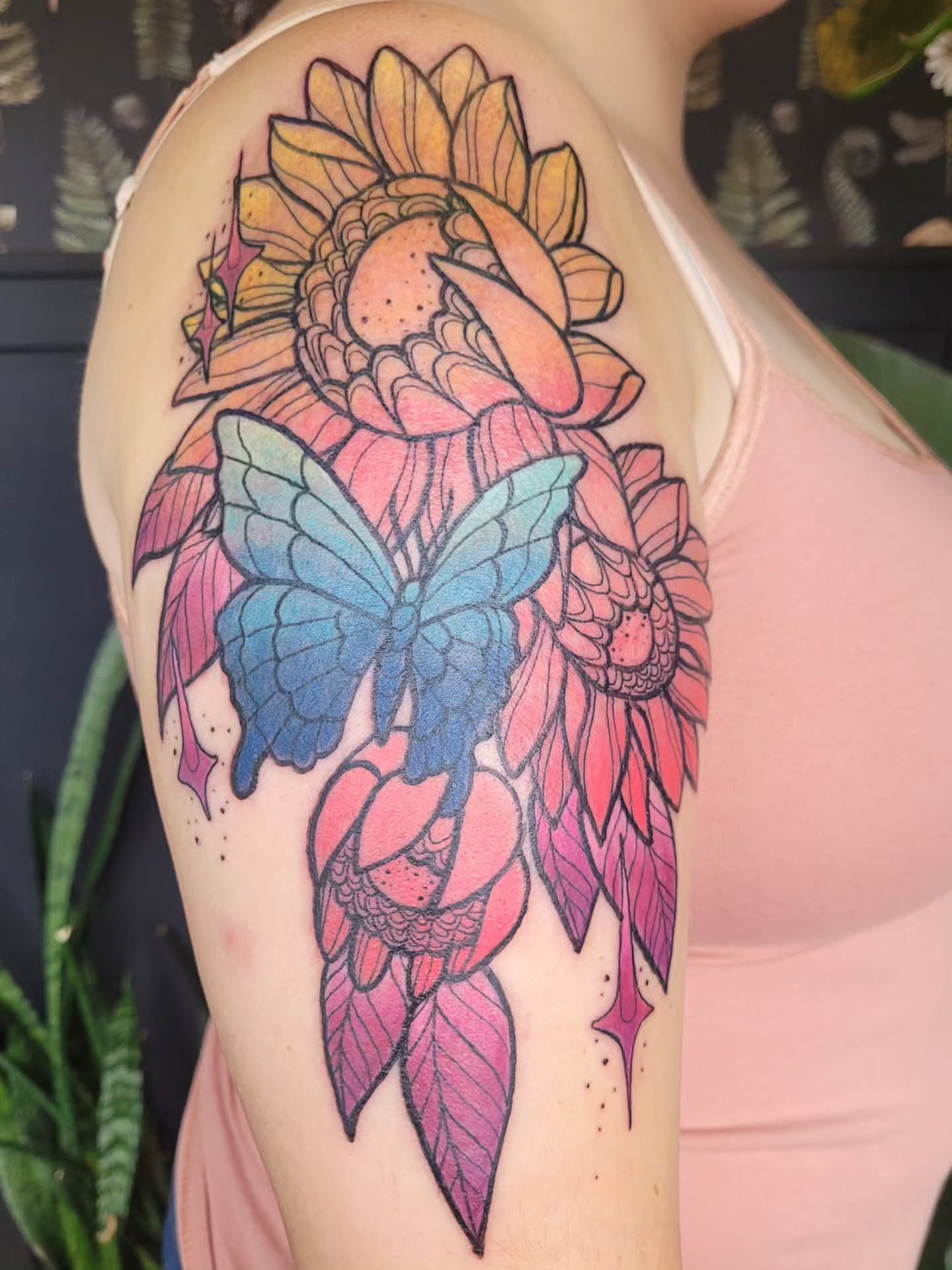 Sunflower and butterfly new school tattoo on the shoulder by Ashley Thomas, Midvale, Utah