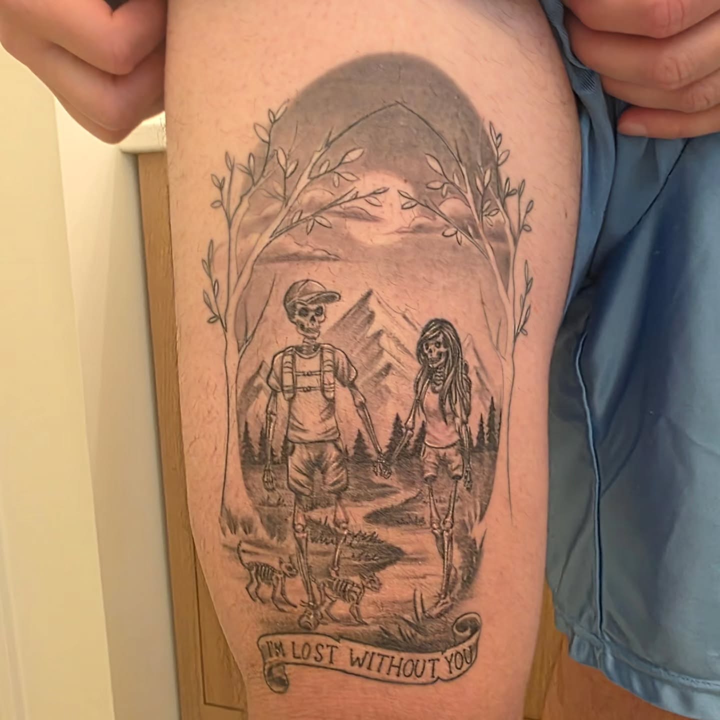 Couple walking in nature realism tattoo on the thigh by Kosta