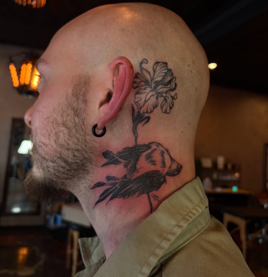 Bird and flower black and grey tattoo on the neck by destany aguilera, Davenport, Iowa