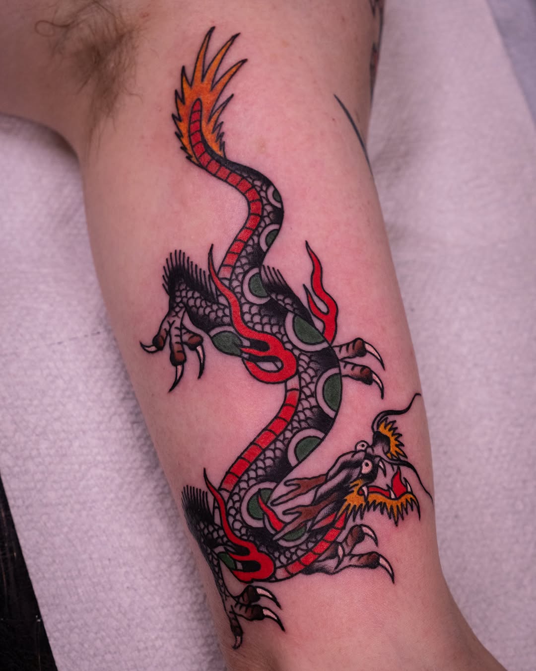 Dragon japanese irezumi tattoo on the forearm by Justin Rakowski