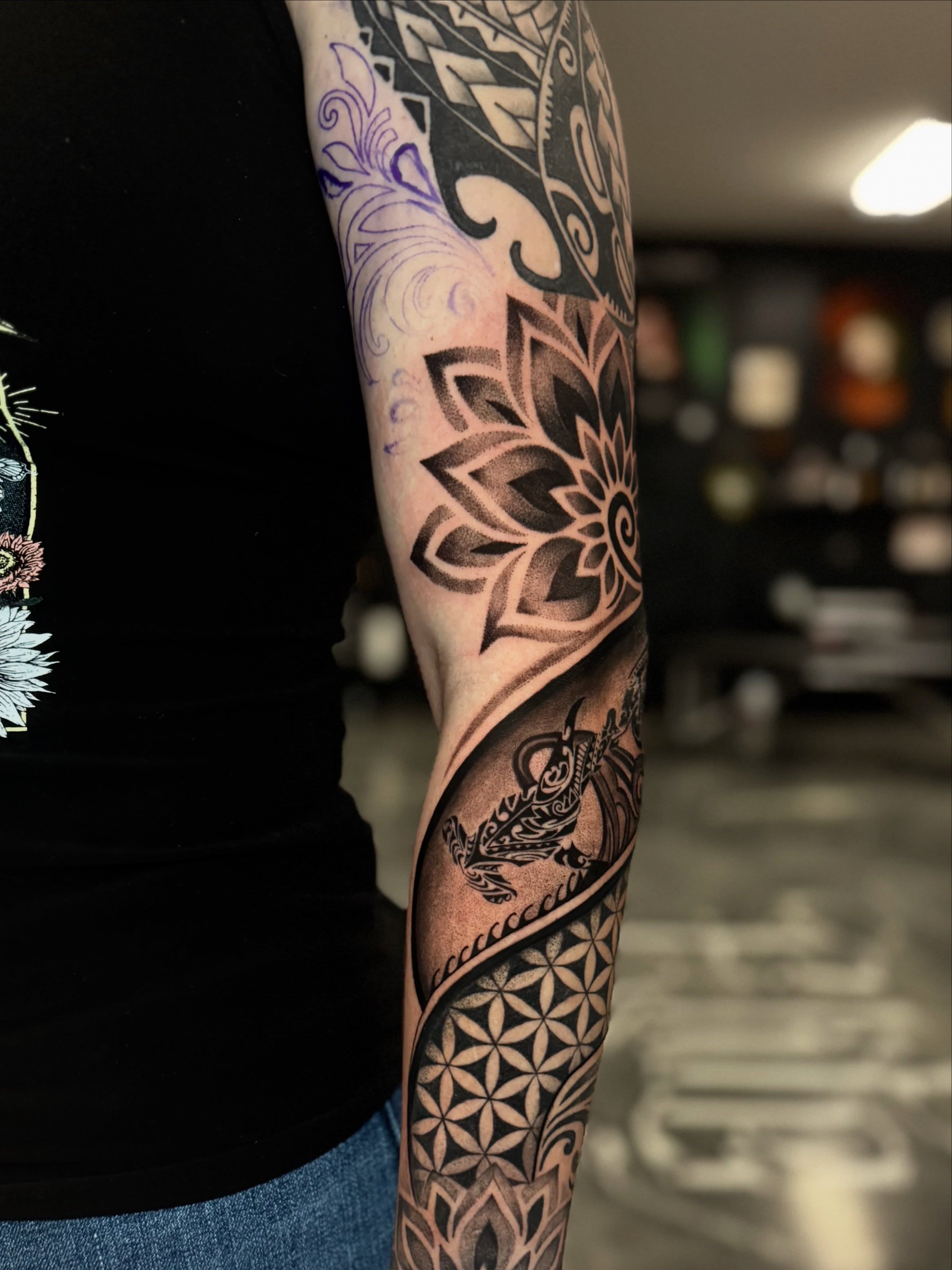 Lotus flower dotwork tattoo on the forearm by Paola Pineda Tattoo, Knoxville, Tennessee