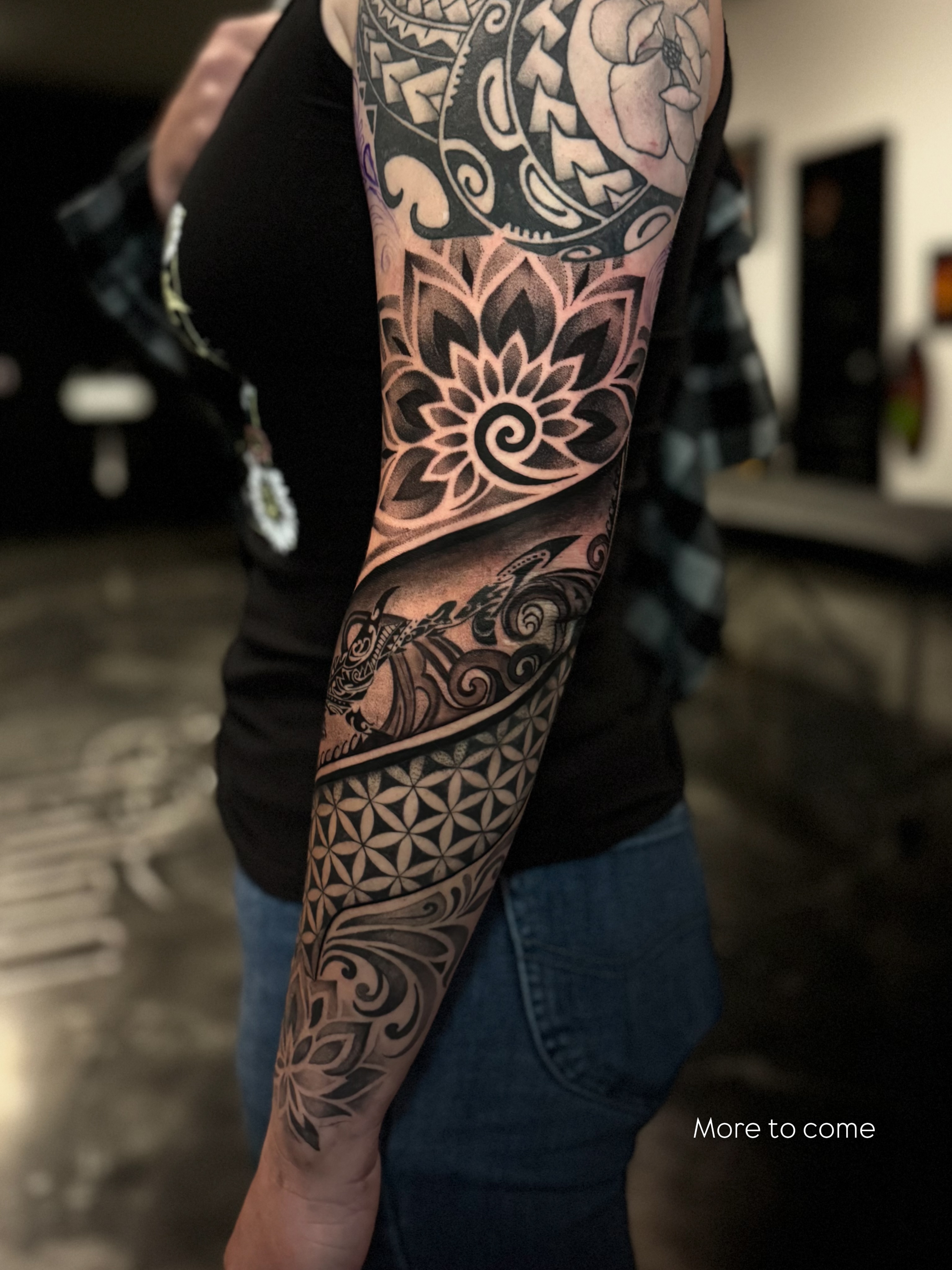 Lotus flower tribal tattoo on the forearm by Paola Pineda Tattoo, Knoxville, Tennessee