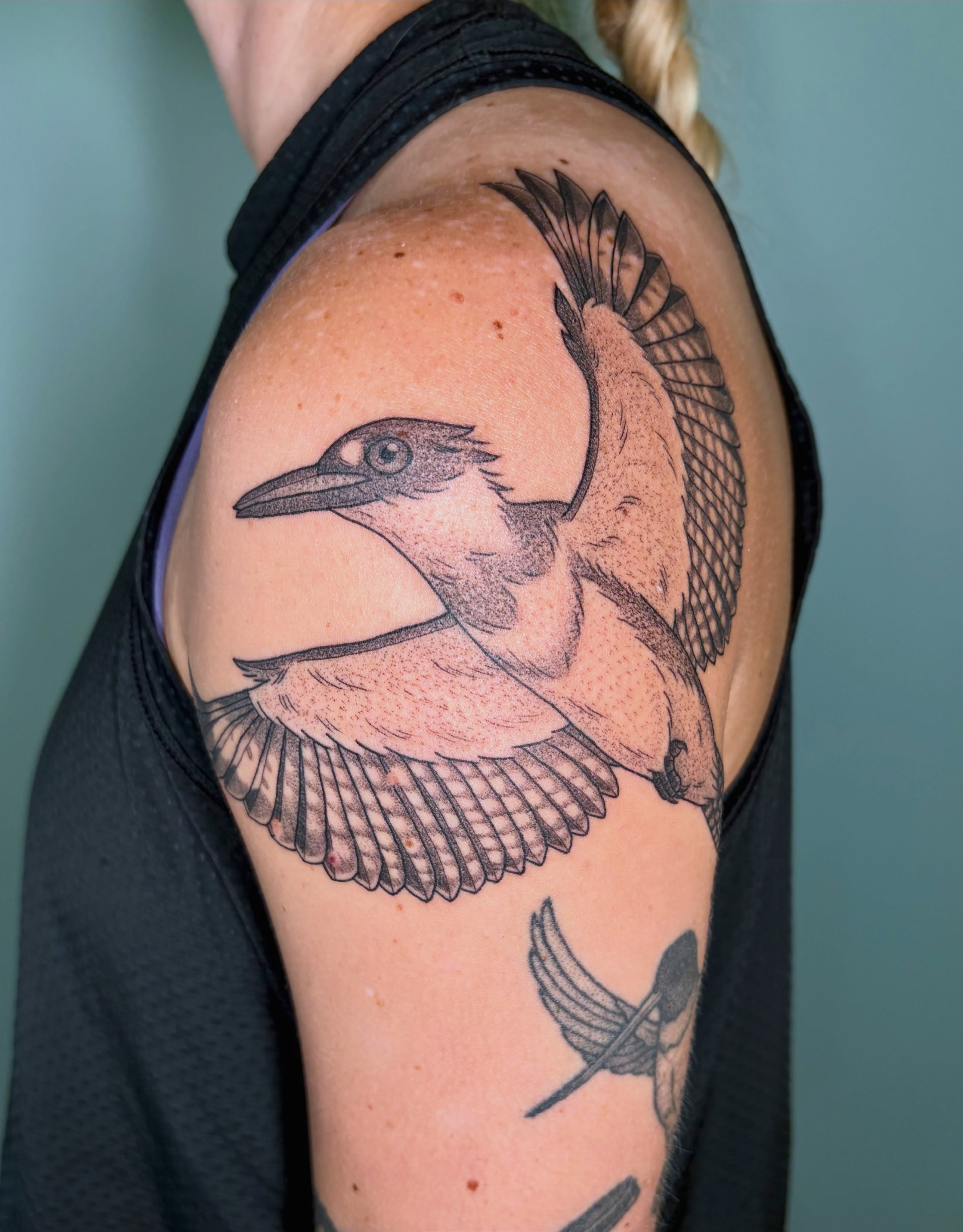 Kingfisher dotwork tattoo on the shoulder by Sarah Roach