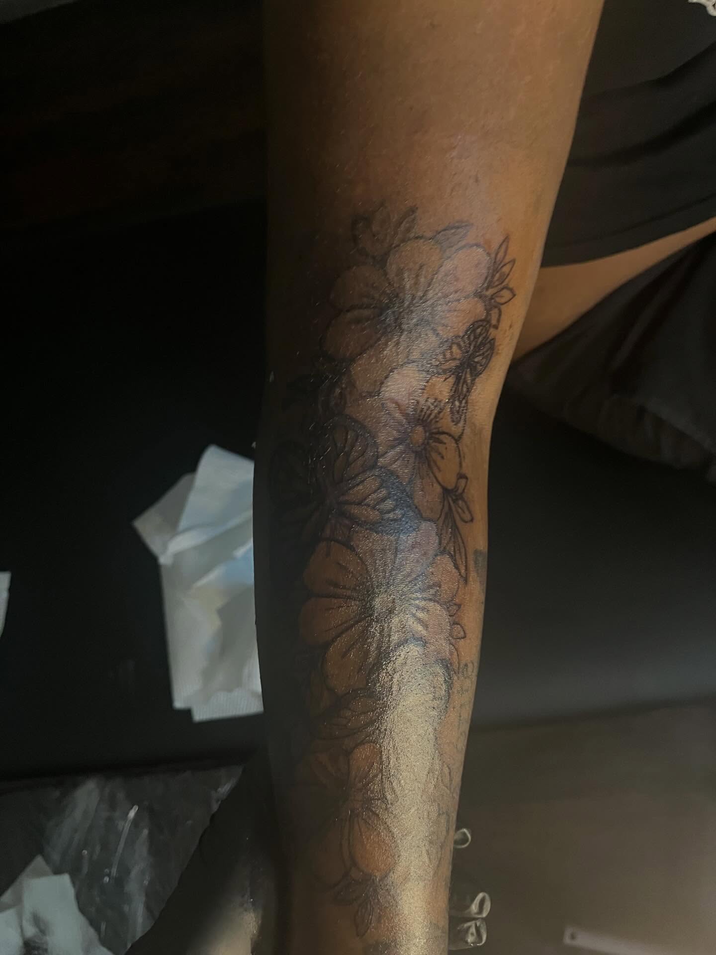 Floral arrangement black and grey tattoo on the forearm by π Westside