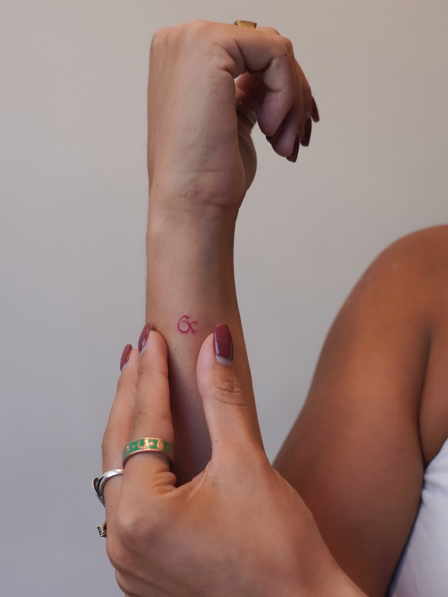 Initials lettering script tattoo on the forearm by Julia