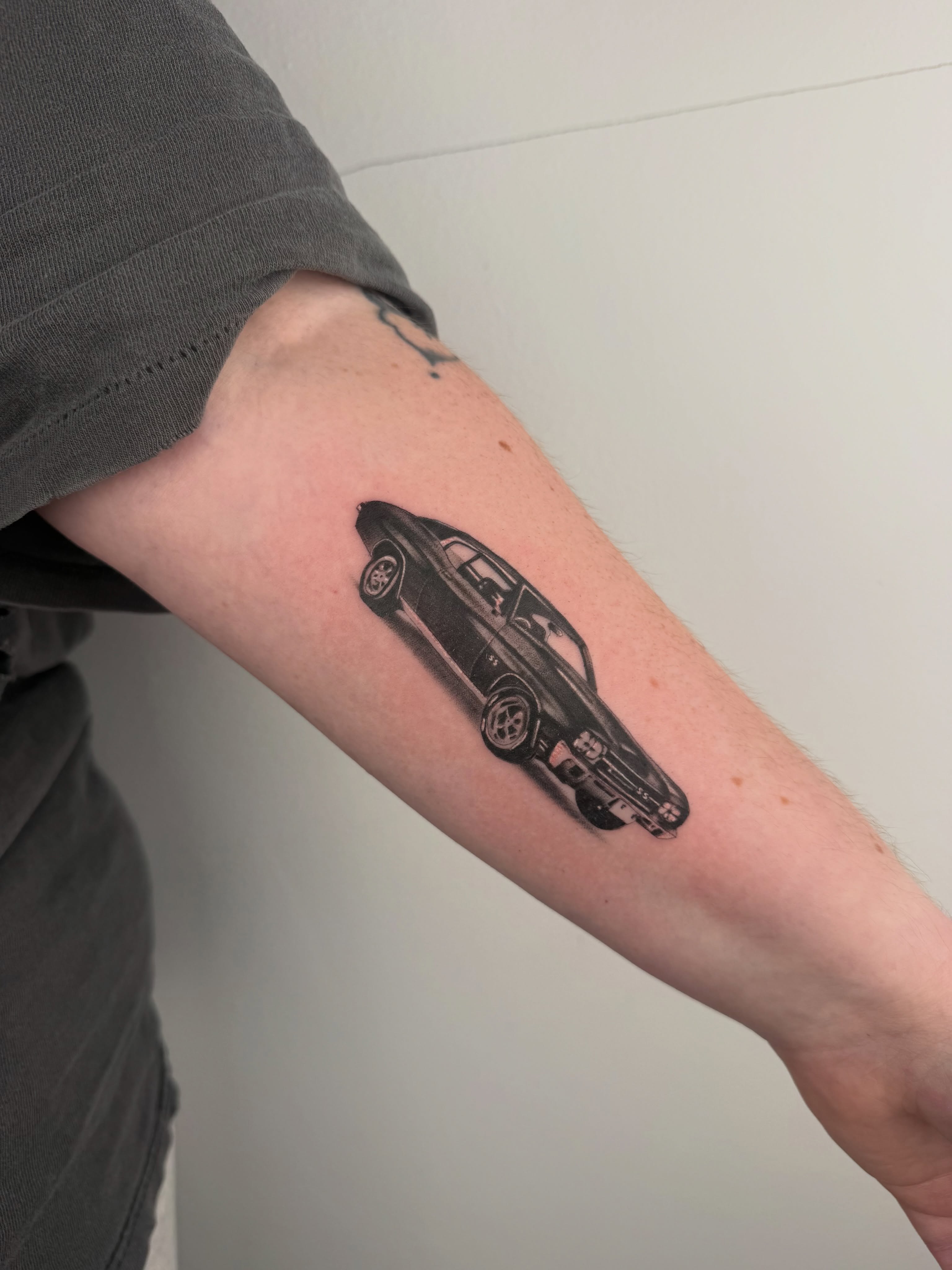 Muscle car black and grey tattoo on the forearm by ⊹ ࣪ ₊✩‧₊˚ 𝖘 𝖙 𝖊 𝖕 𝖍 𝖆 𝖓 𝖎 𝖊 ˚₊‧✩₊ ࣪ ⊹