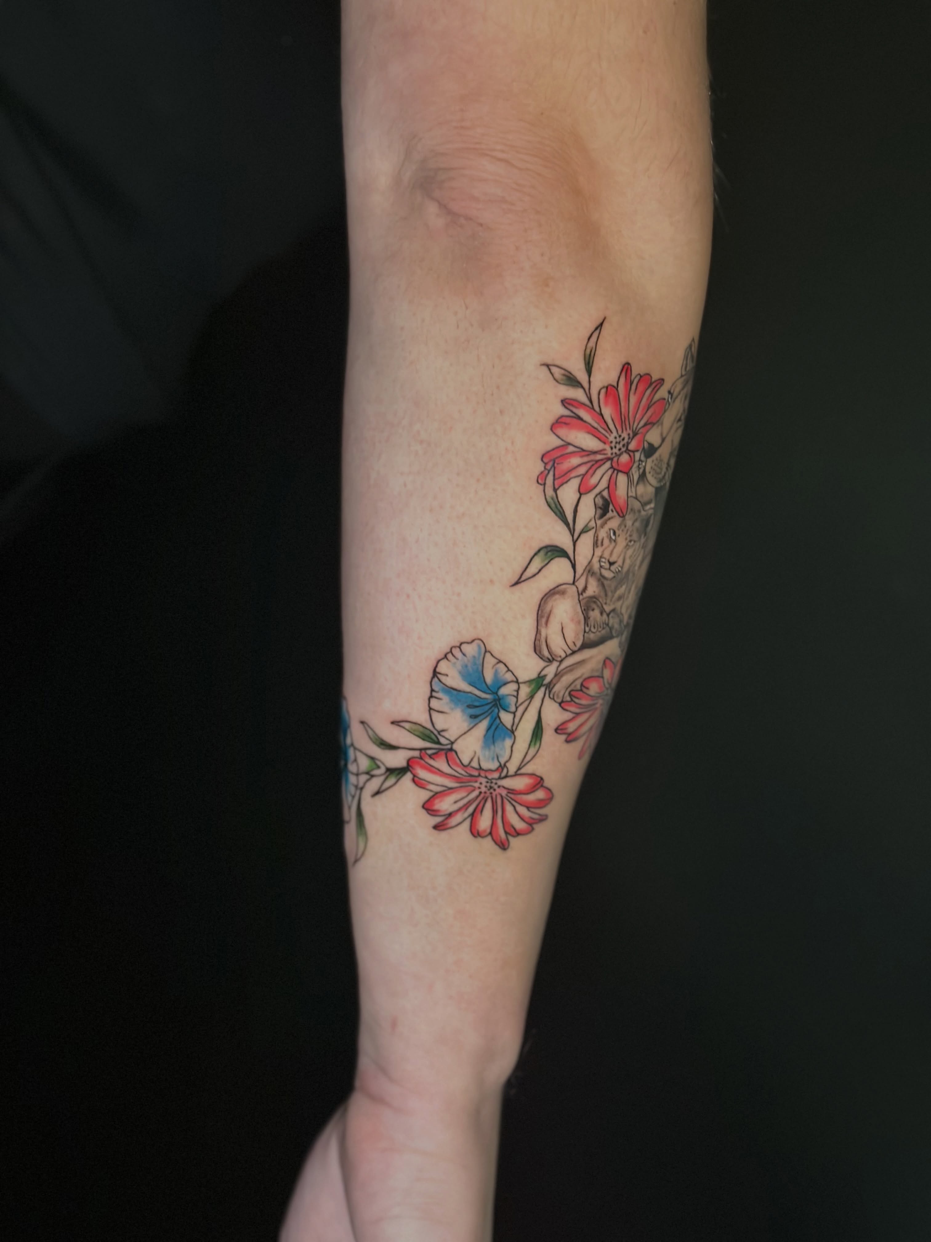 Flowers and rabbit new school tattoo on the forearm by AJ