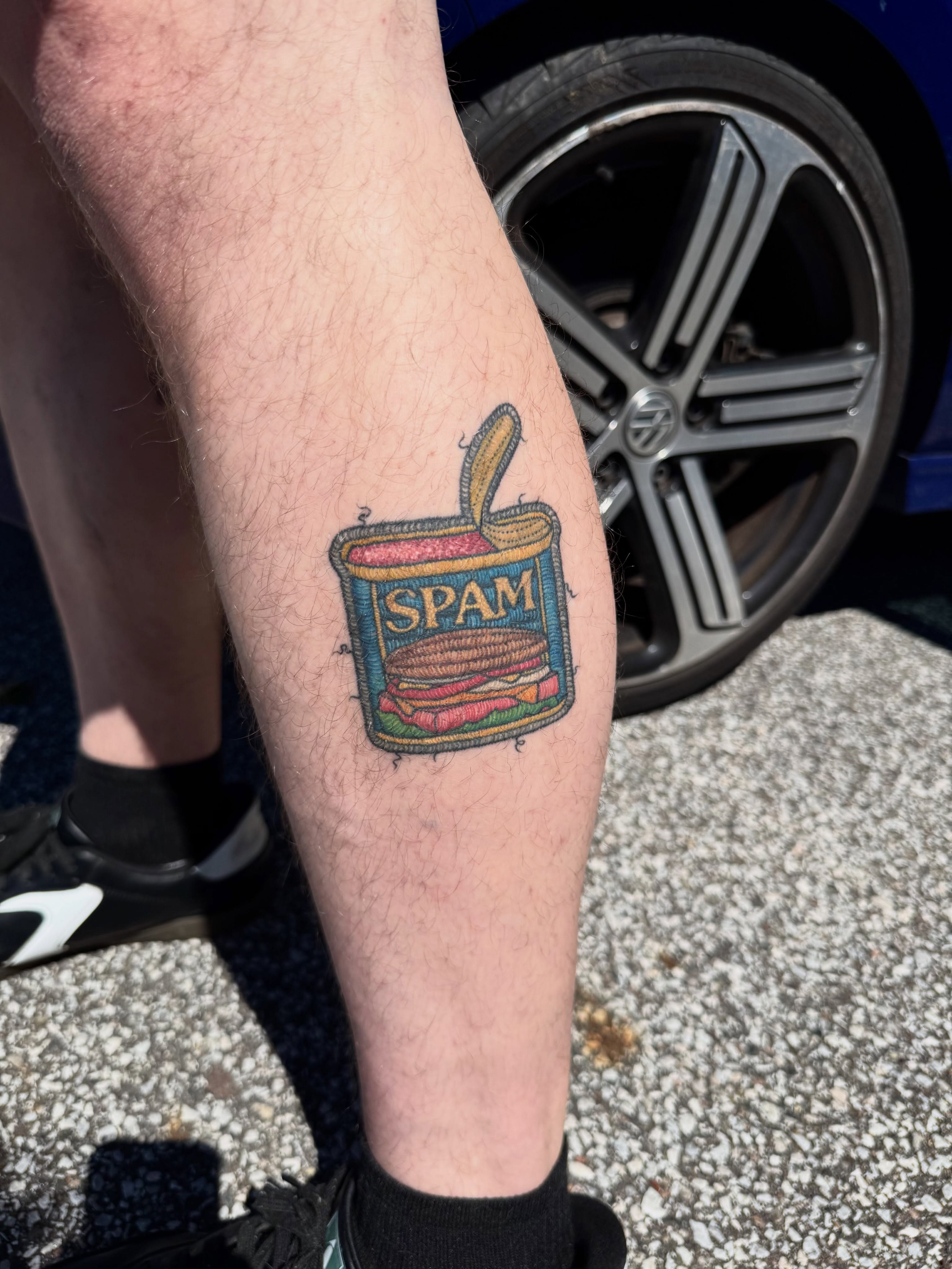 Spam can realism tattoo on the forearm by Max