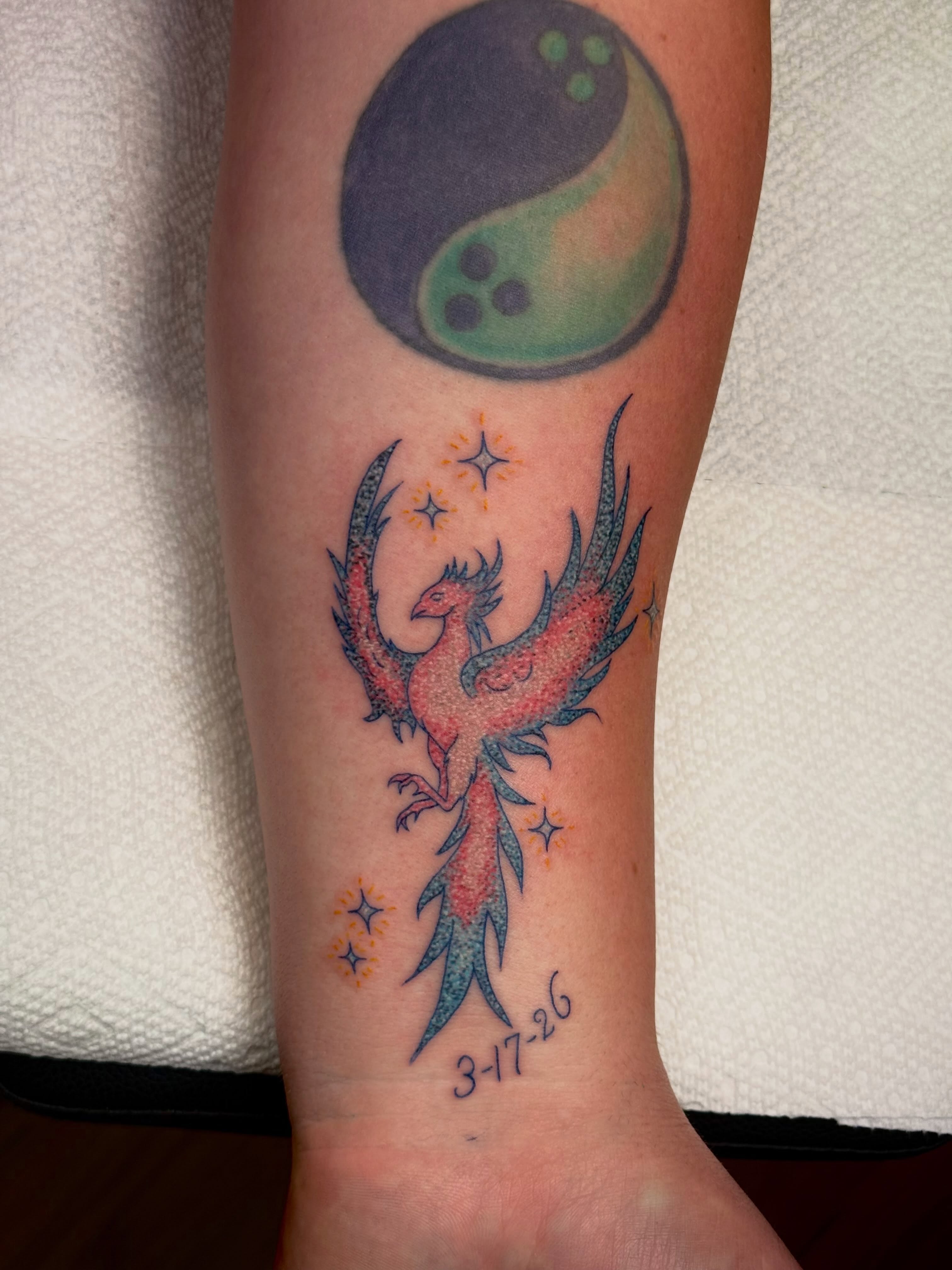 Phoenix new school tattoo on the forearm by Max