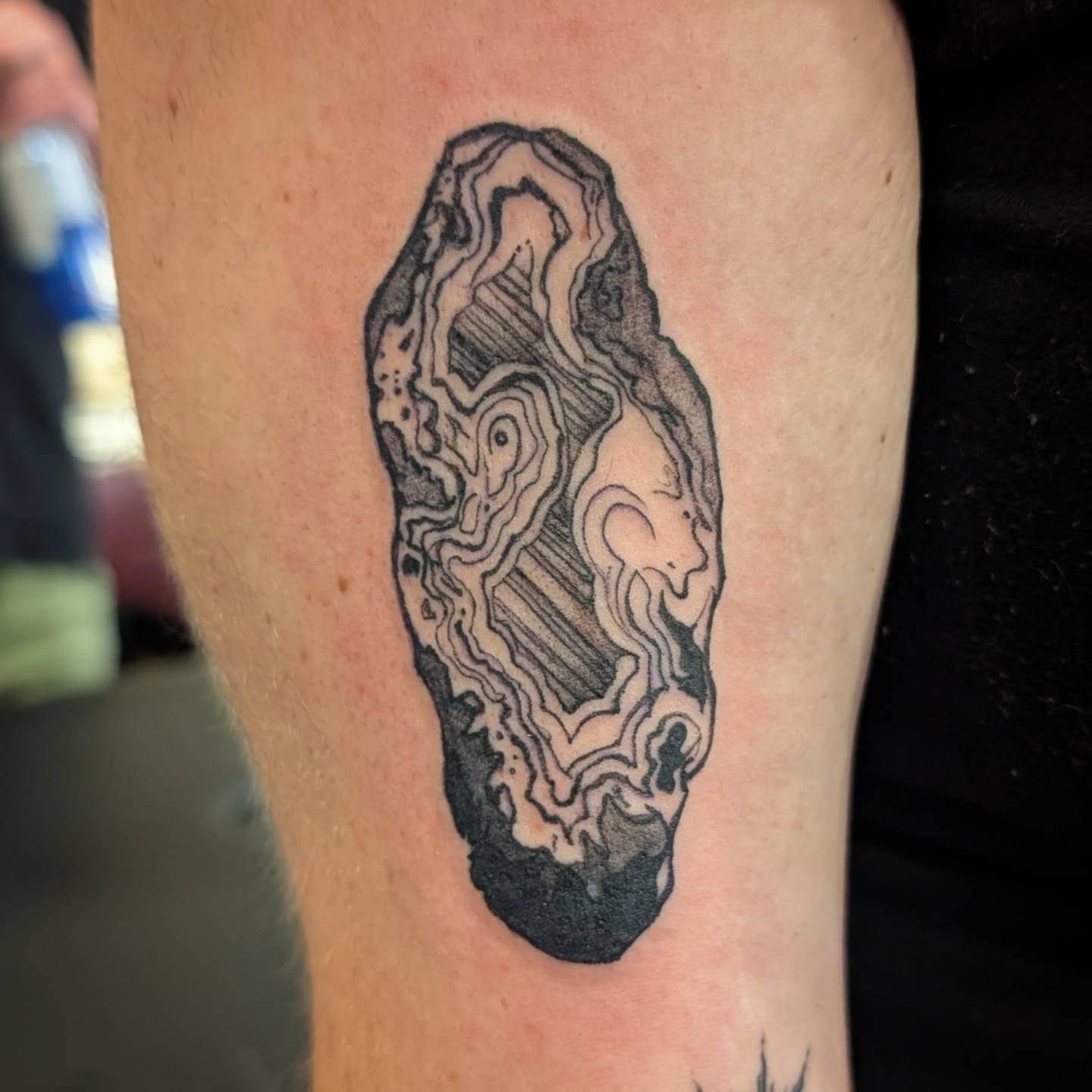 Geode realism tattoo on the forearm by Michaela May