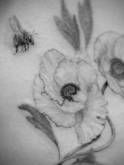 Poppy flower black and grey tattoo on the shoulder by Aries Rising