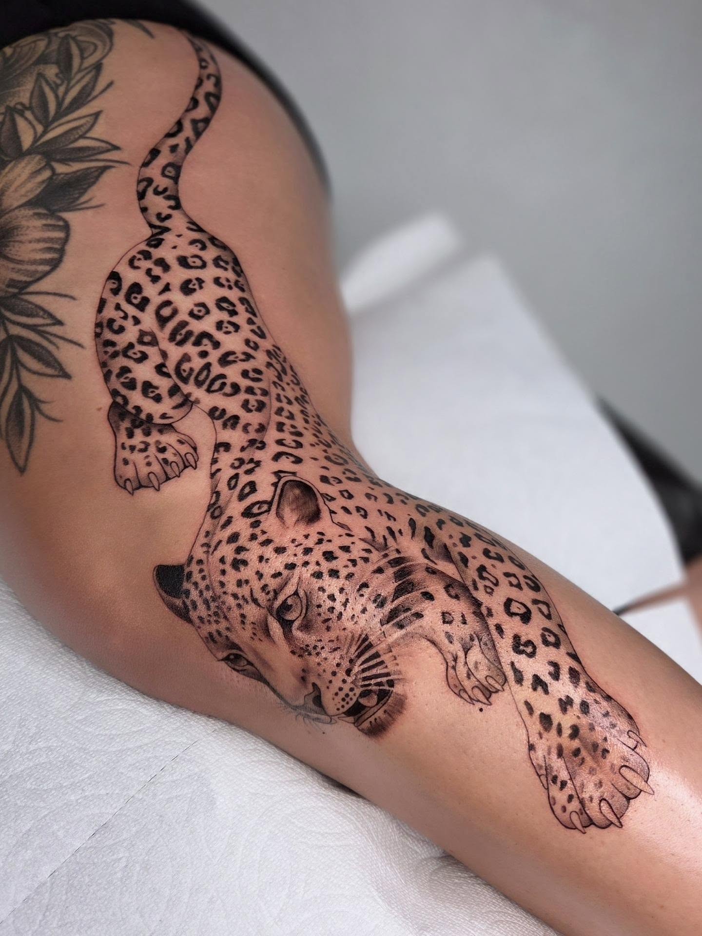 Leopard realism tattoo on the forearm by Yvette Cebreros