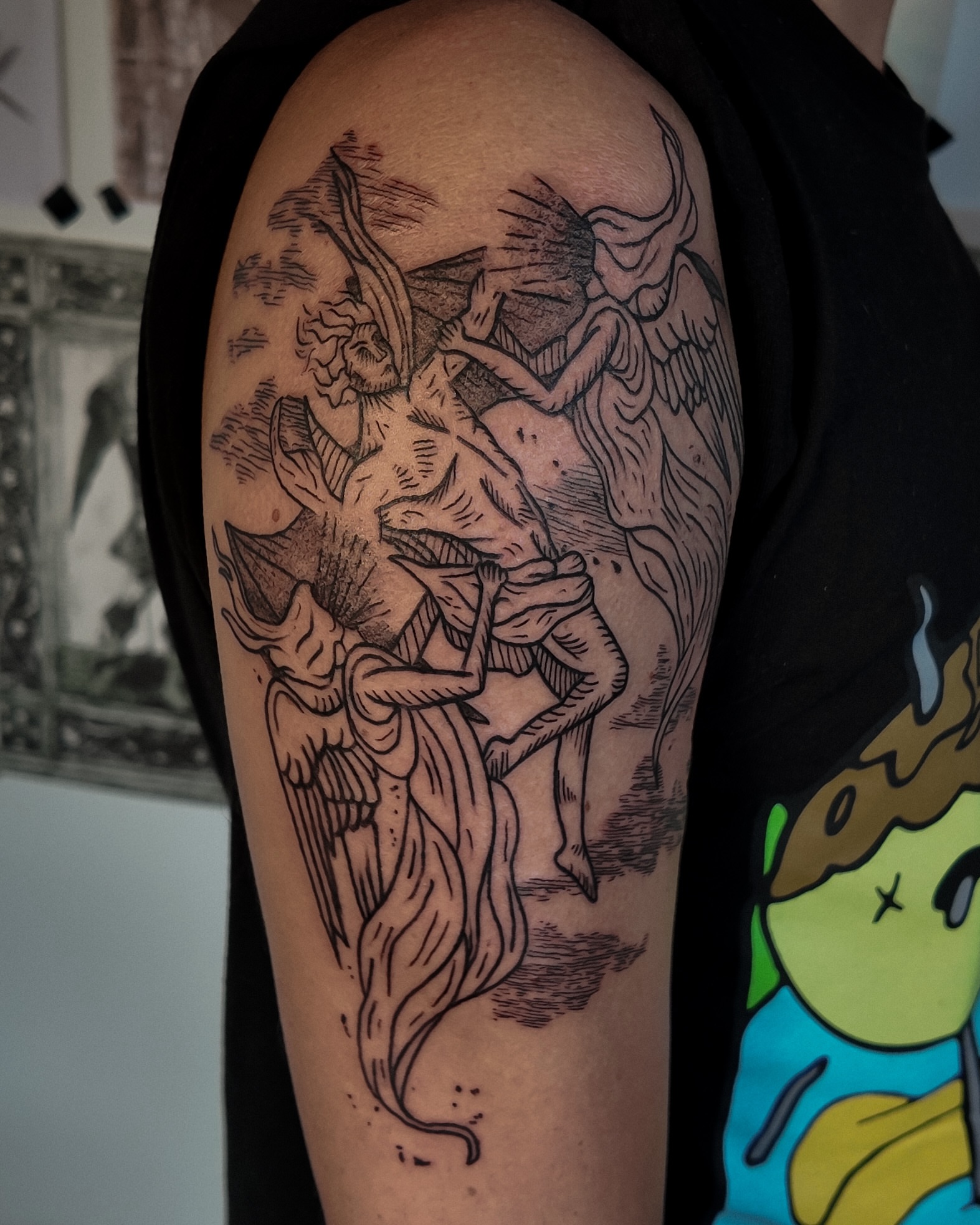 Mythical creatures realism tattoo on the upper arm by Morgan Diann