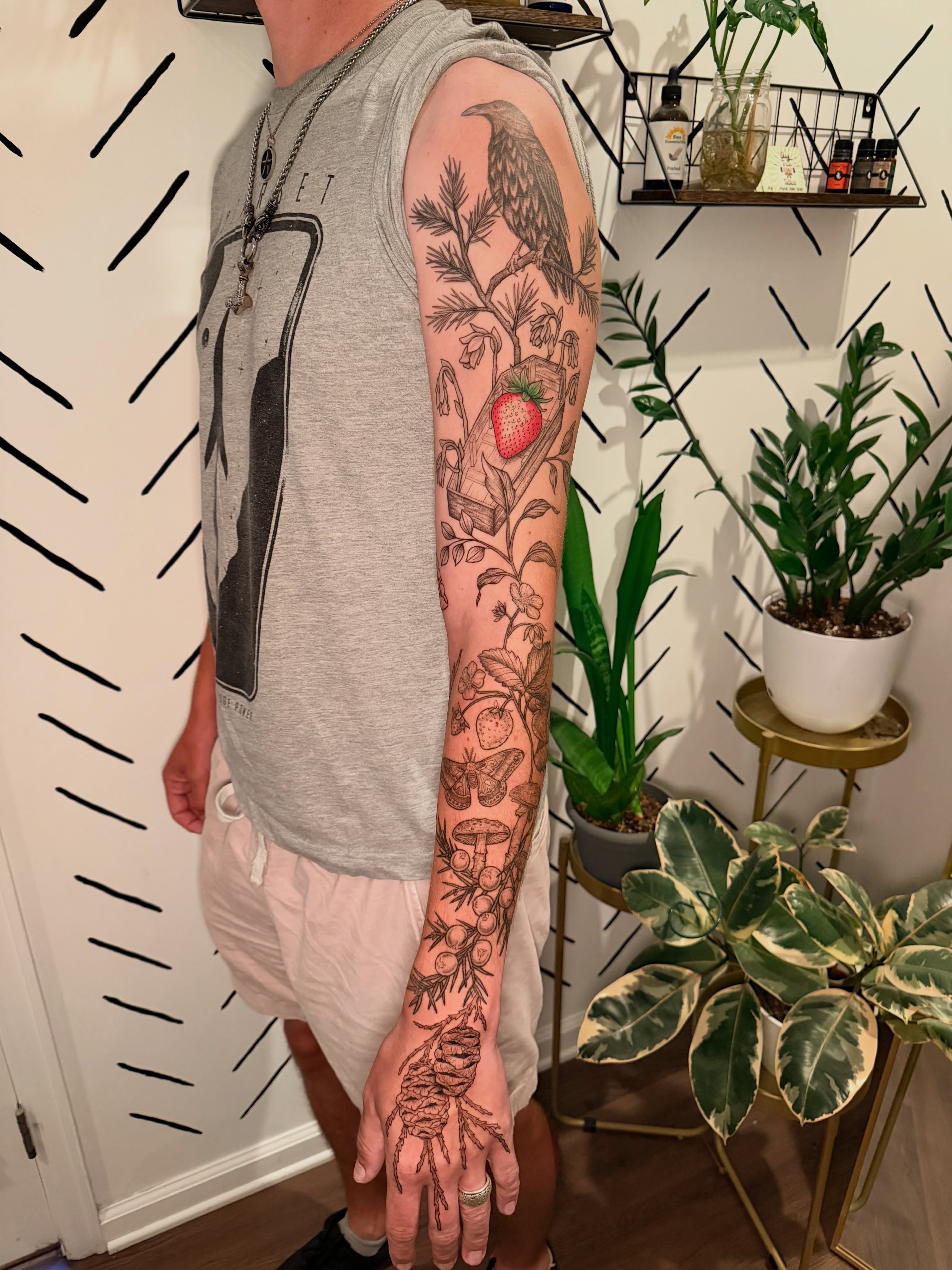 Strawberry and bird black and grey tattoo on the forearm by ππ£ππ€π₯π ππ¦ππ‘π, Lakewood, Colorado