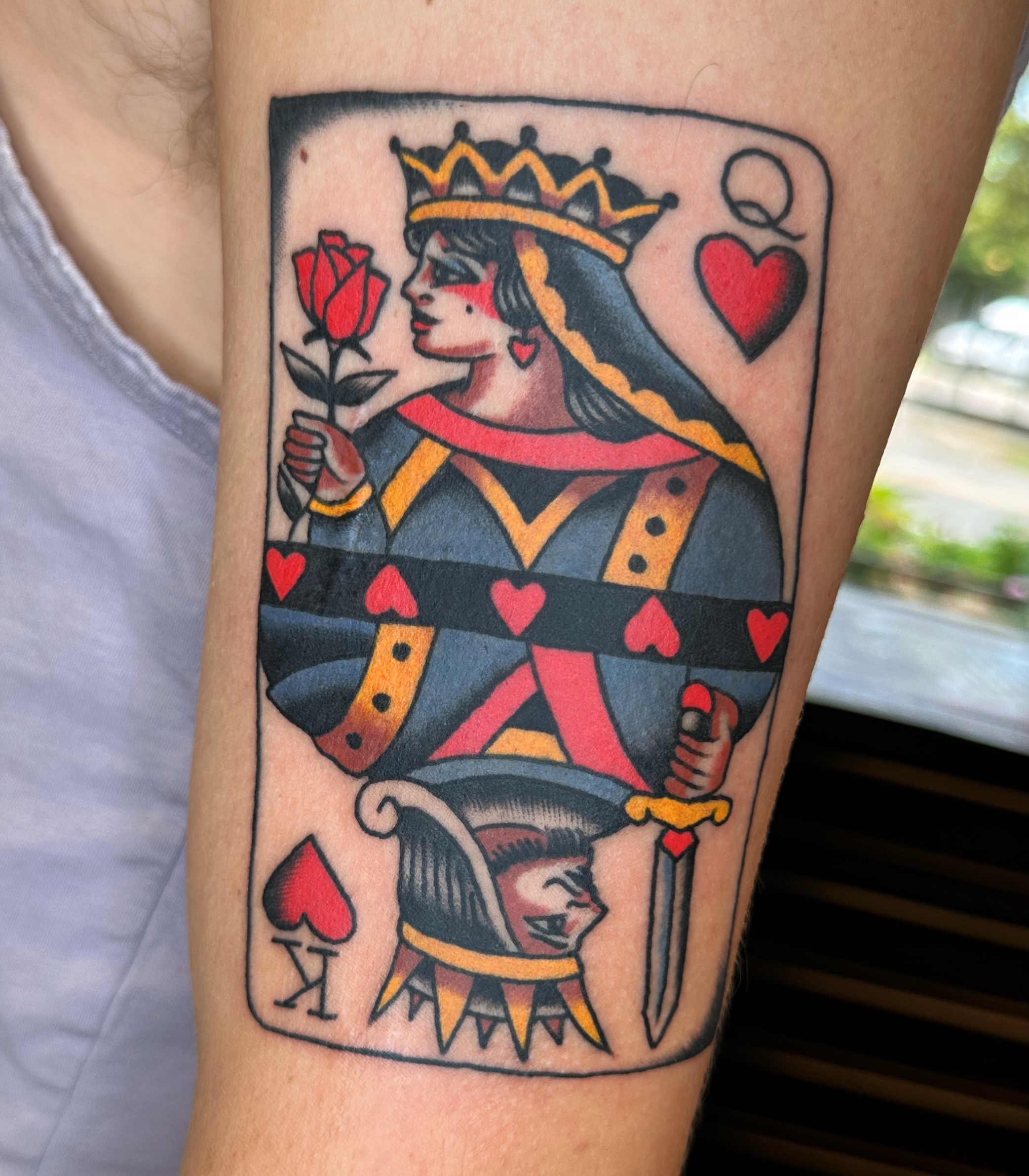 Queen of hearts American traditional tattoo on the forearm by Brock Johnson