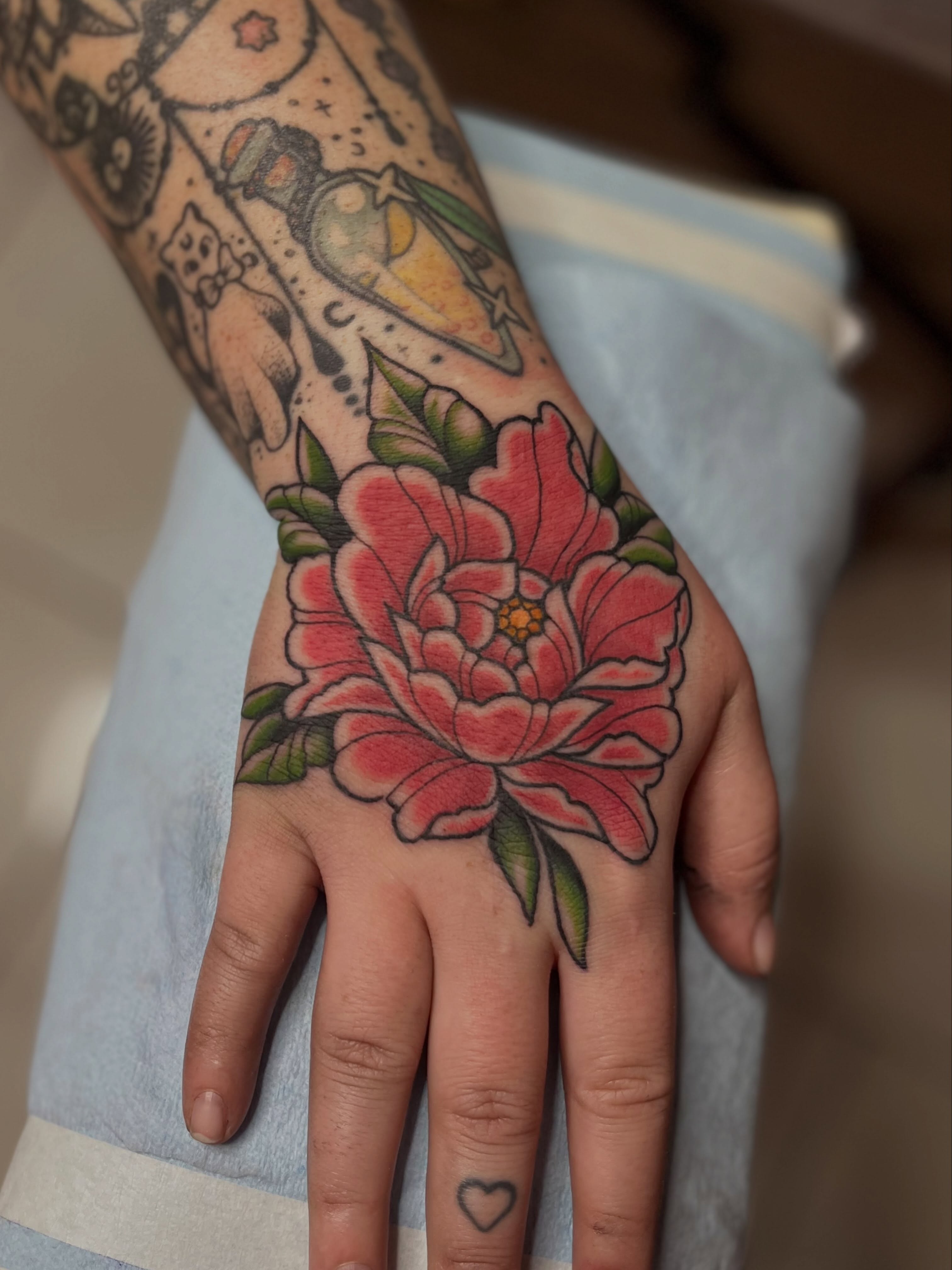 Peony flower American traditional tattoo on the hand by ✨ Chris ✨