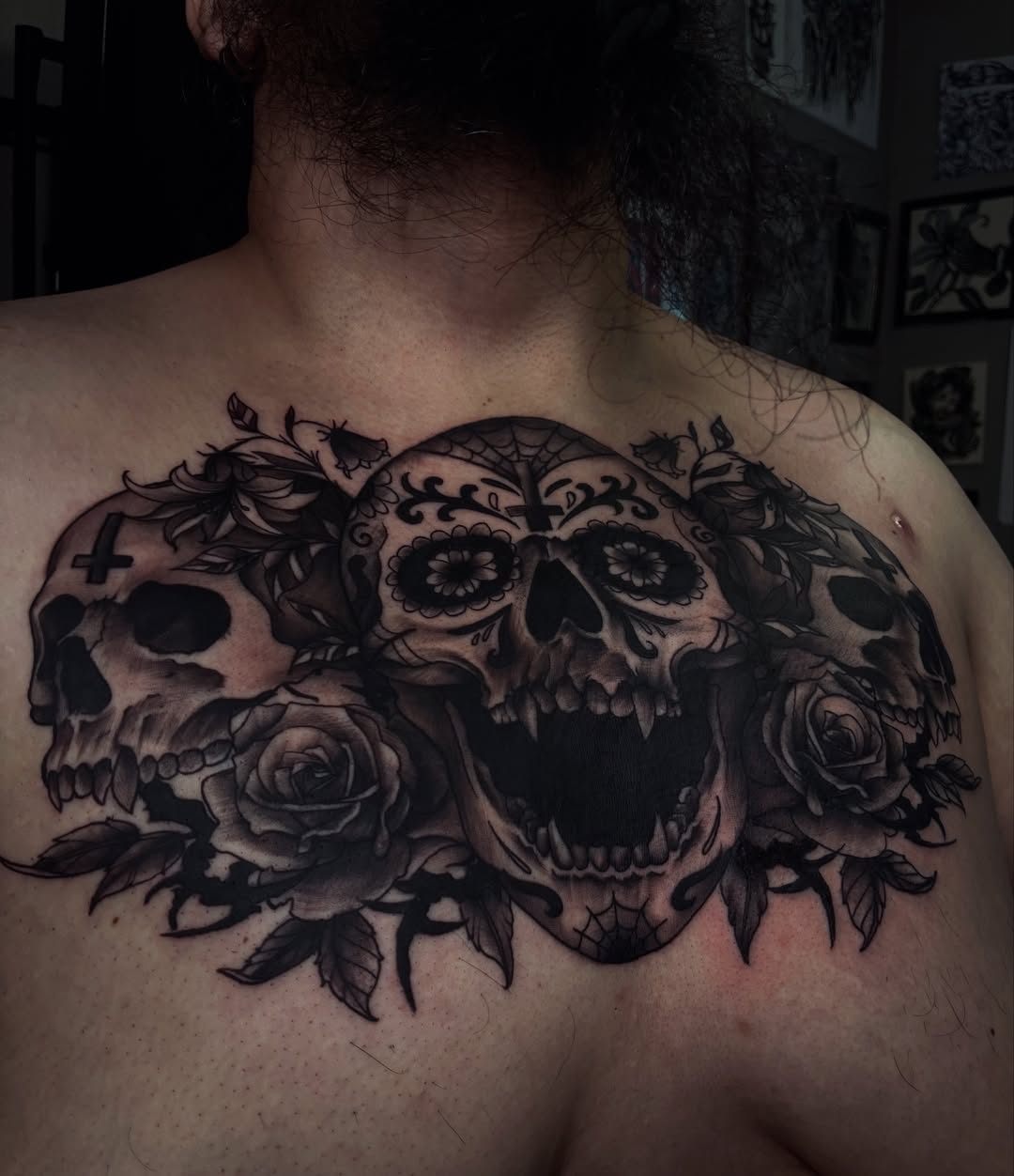 Skulls and roses realism tattoo on the back by Nessa, Las Vegas, Nevada