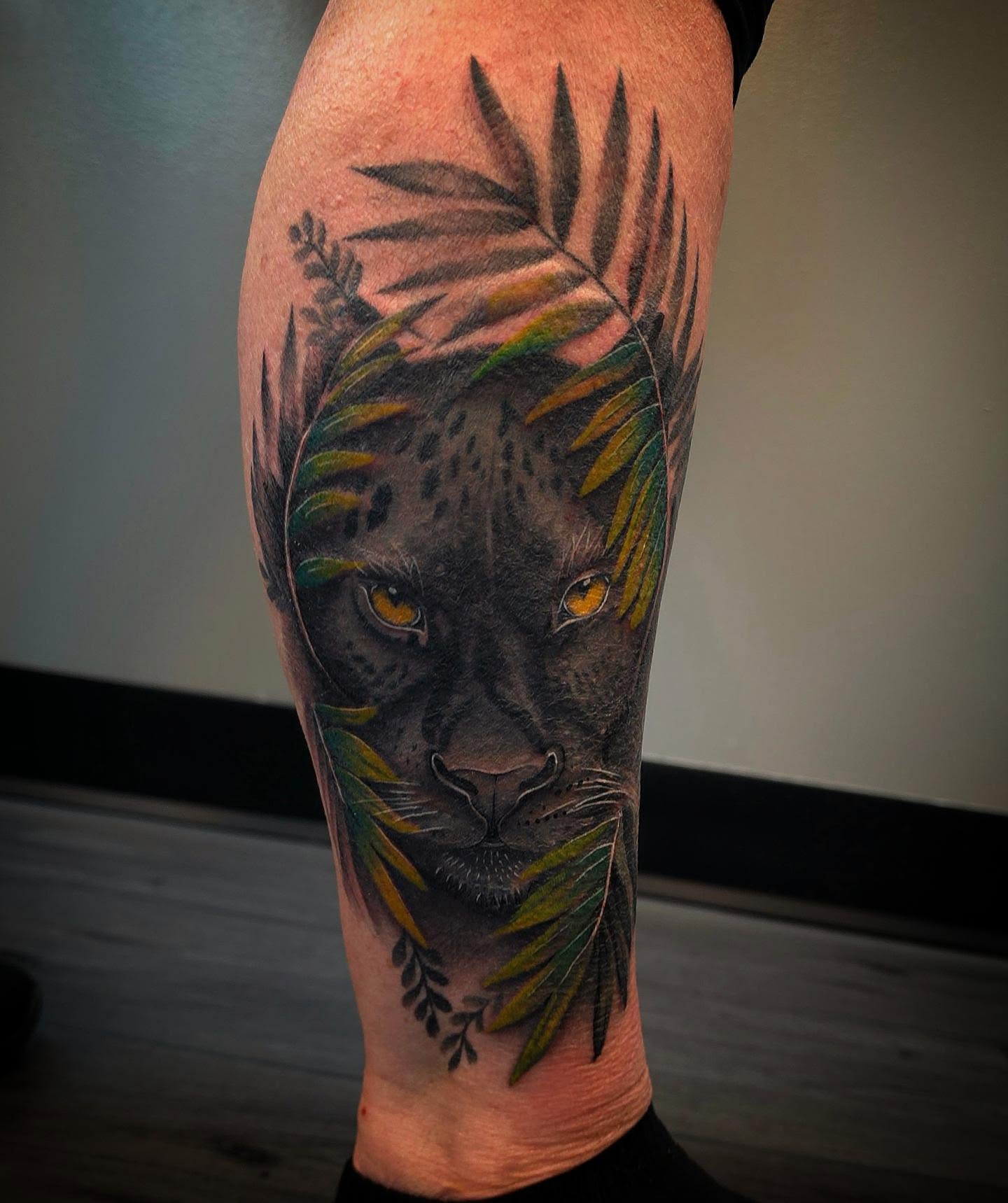 Panther realism tattoo on the calf by Danielle Elizabeth
