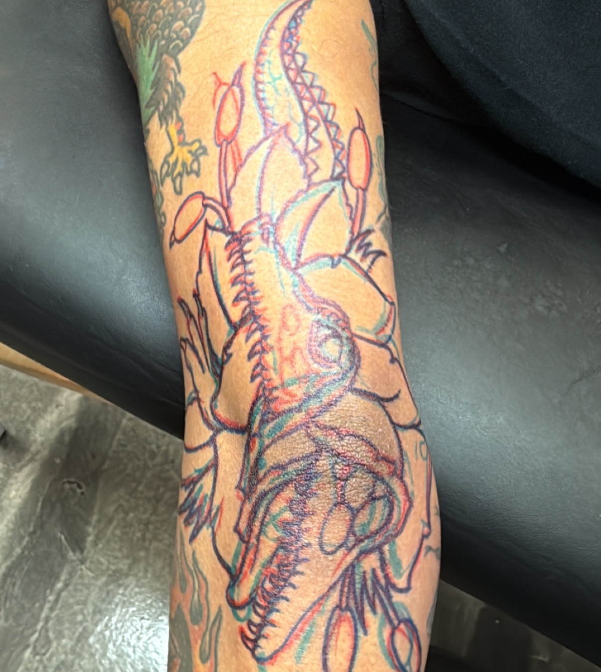 Lobster American traditional tattoo on the forearm by Dave Osrowitz