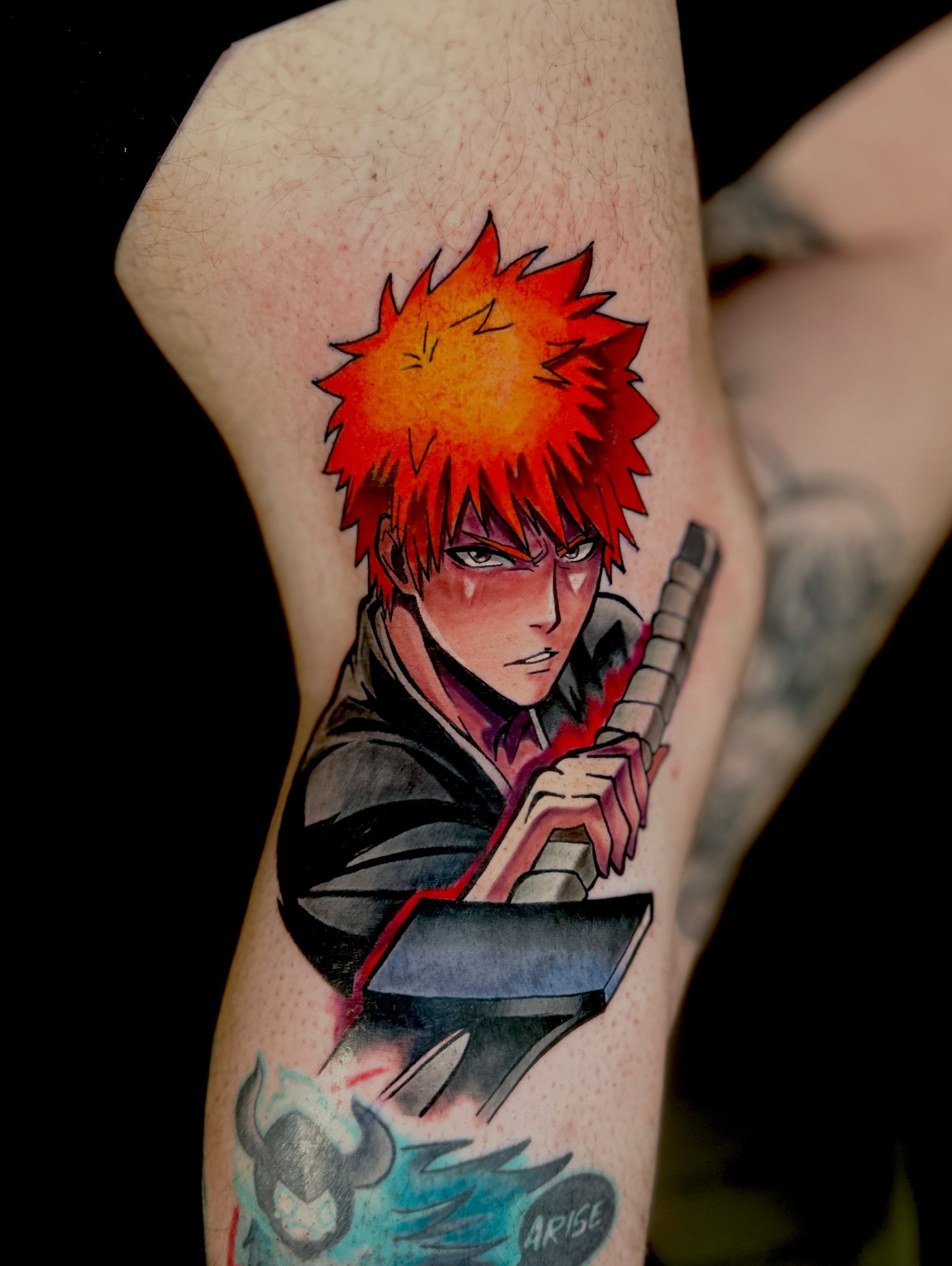 Anime character anime tattoo on the forearm by Austin Young