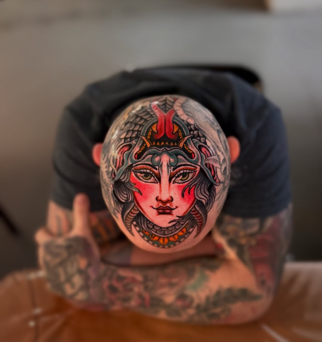 Woman's face American traditional tattoo on the head by Cole Pittman Memphis Tattoo artist, Memphis, Tennessee