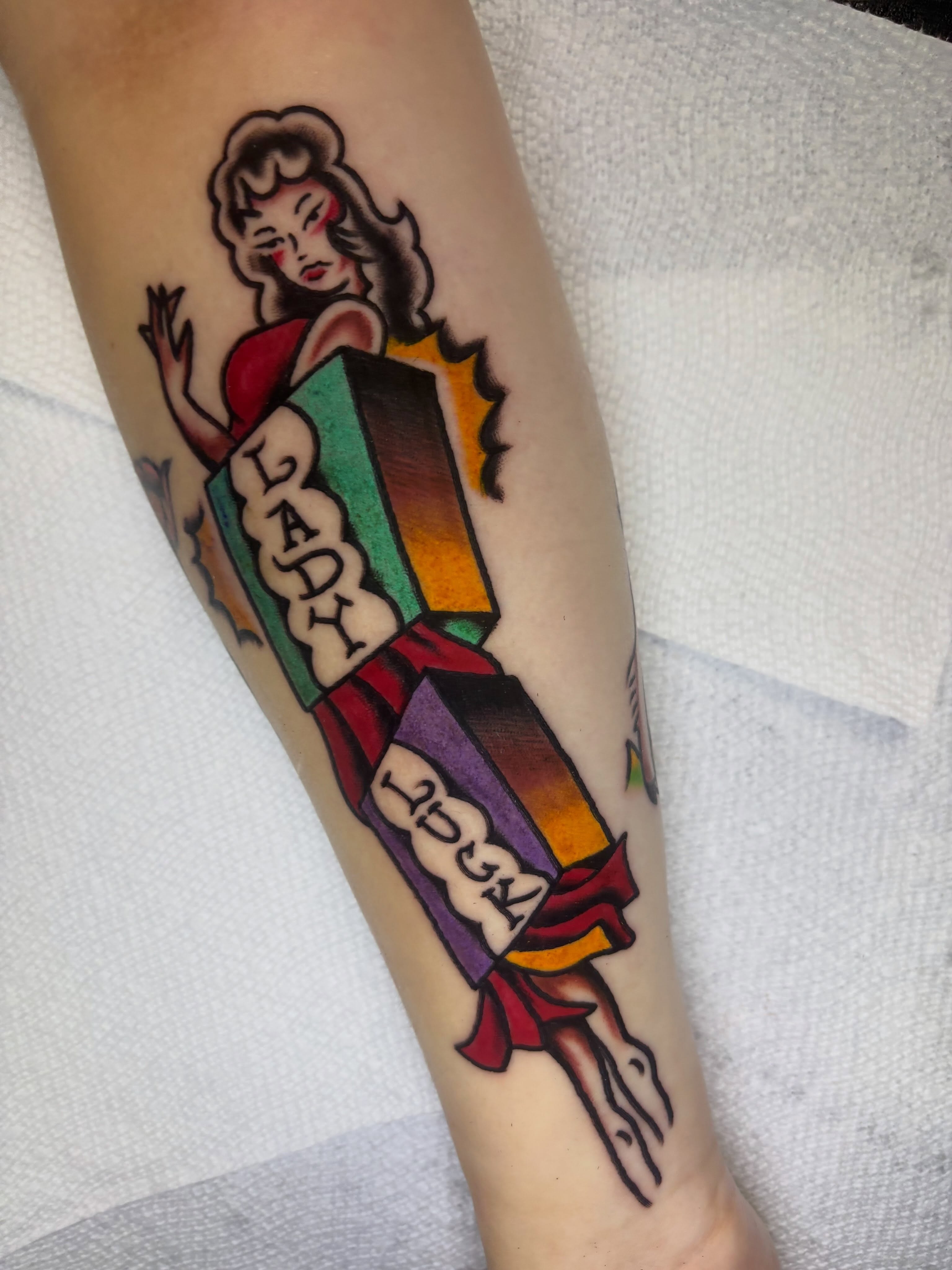 Lady holding book American traditional tattoo on the forearm by Bold Will Hold ๐ค