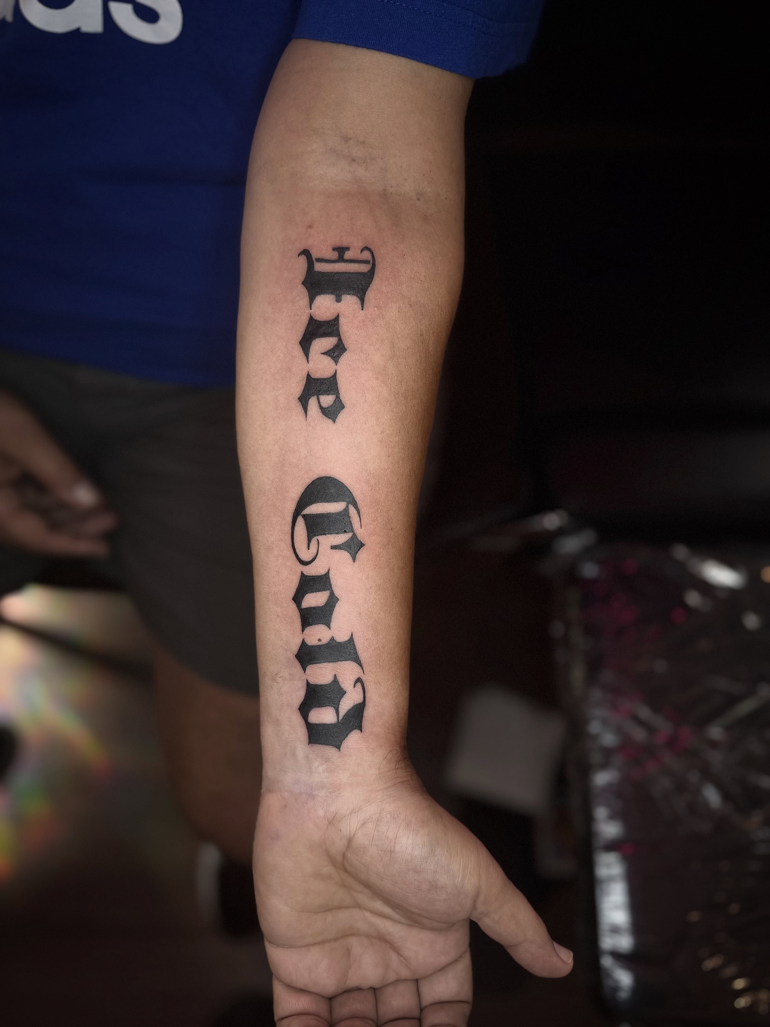 Lettering lettering script tattoo on the forearm by Honey