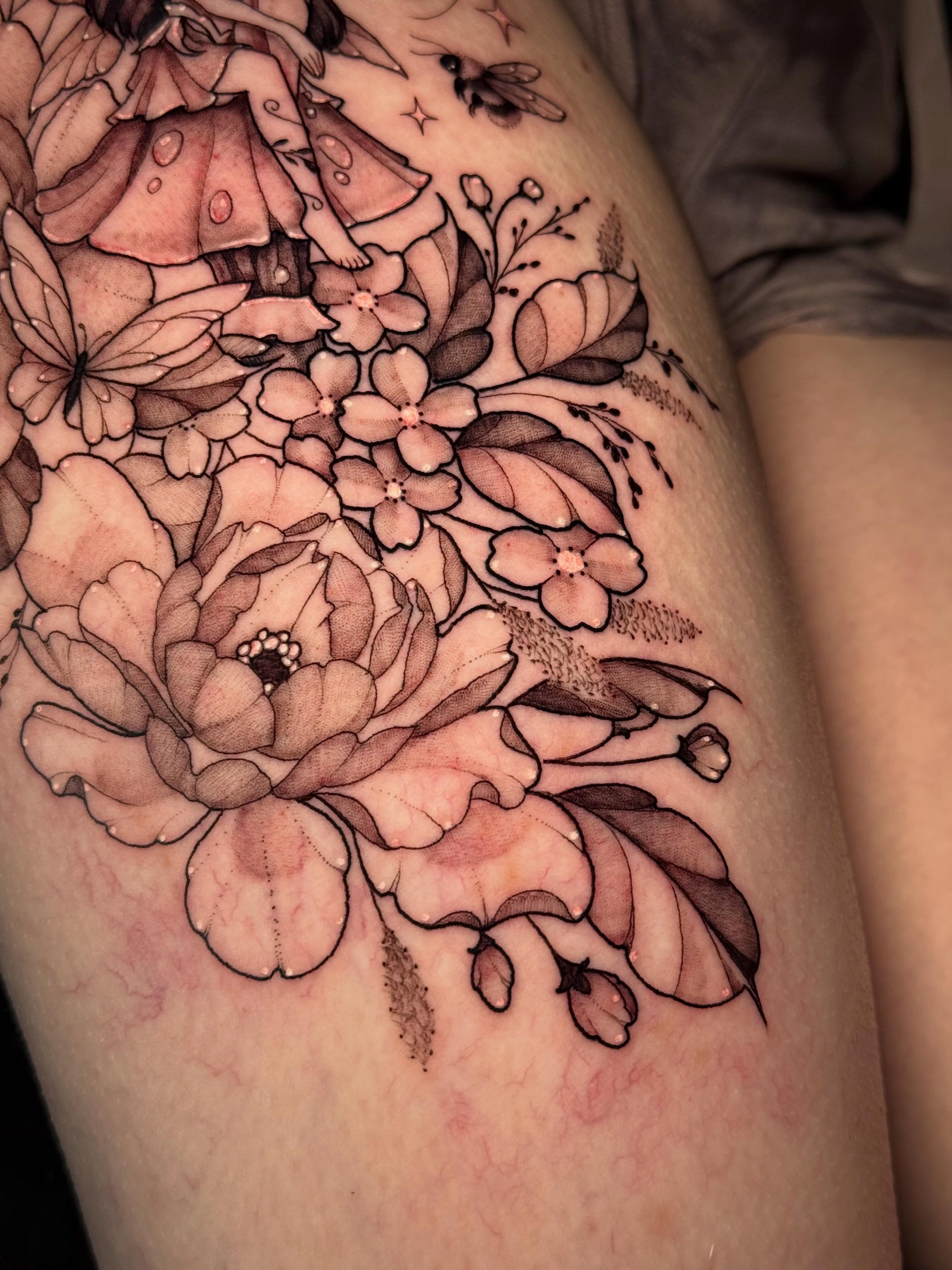 Floral bouquet black and grey tattoo on the thigh by Andreanna Rosemarie Gabranidis, Pennsauken, New Jersey